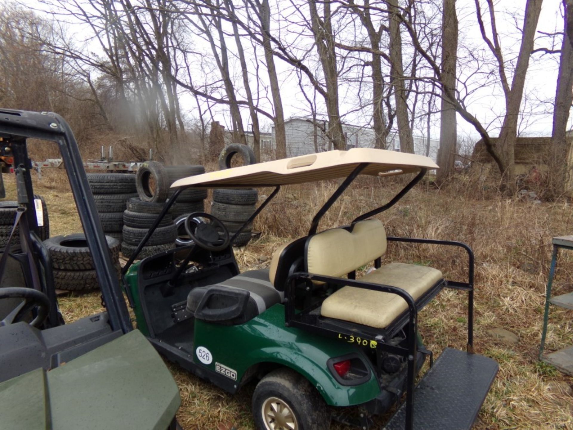 EZGO Golf Cart w/ Roof & Rear Seat, Green, NO ENGINE, MISSING WHEELS, ROUGH CONDITION (526)