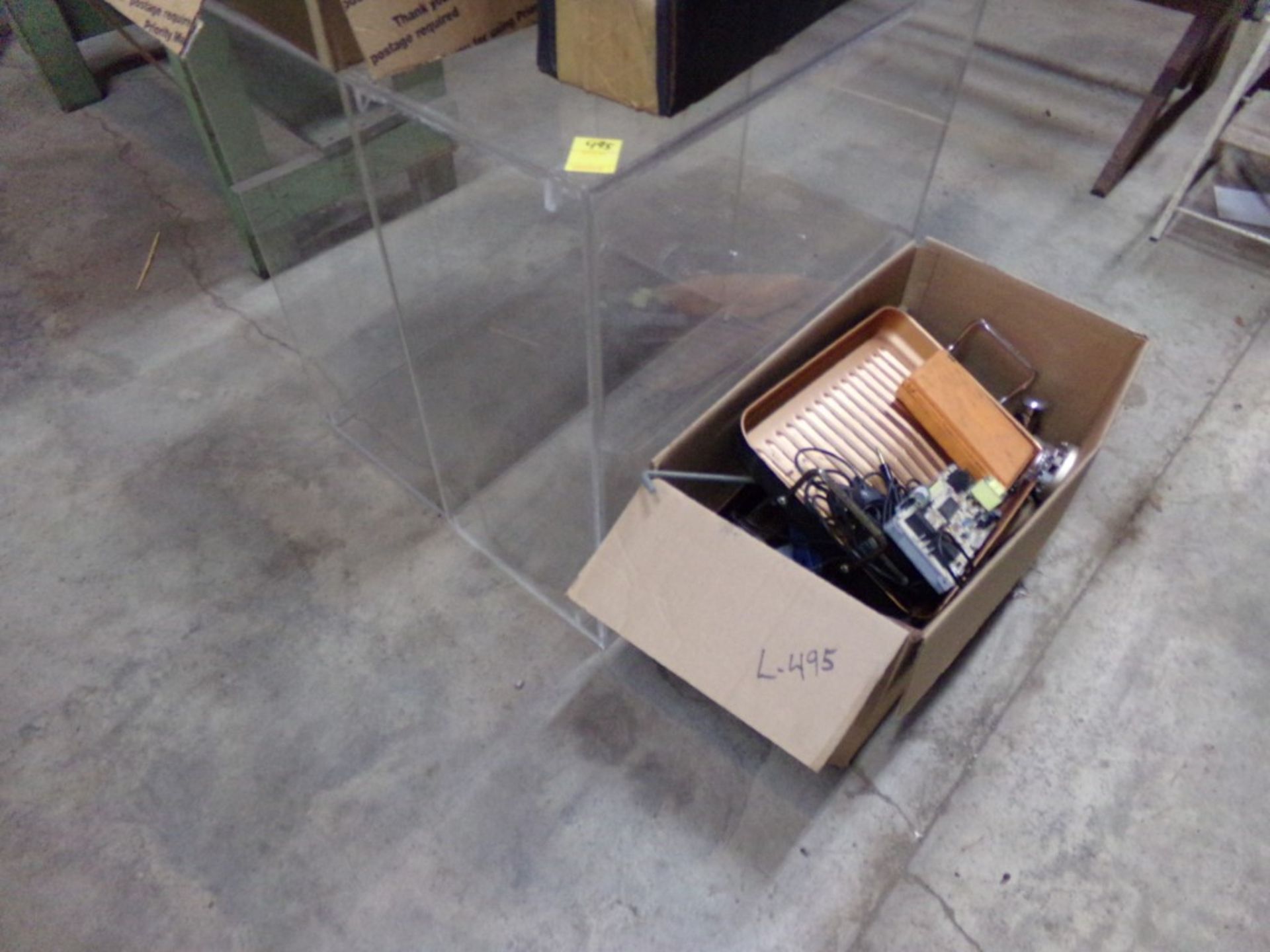 Box With Heater Parts, Thermostats, Caulk Guns, Office Tools, Etc. and (2) Clear Plexiglass