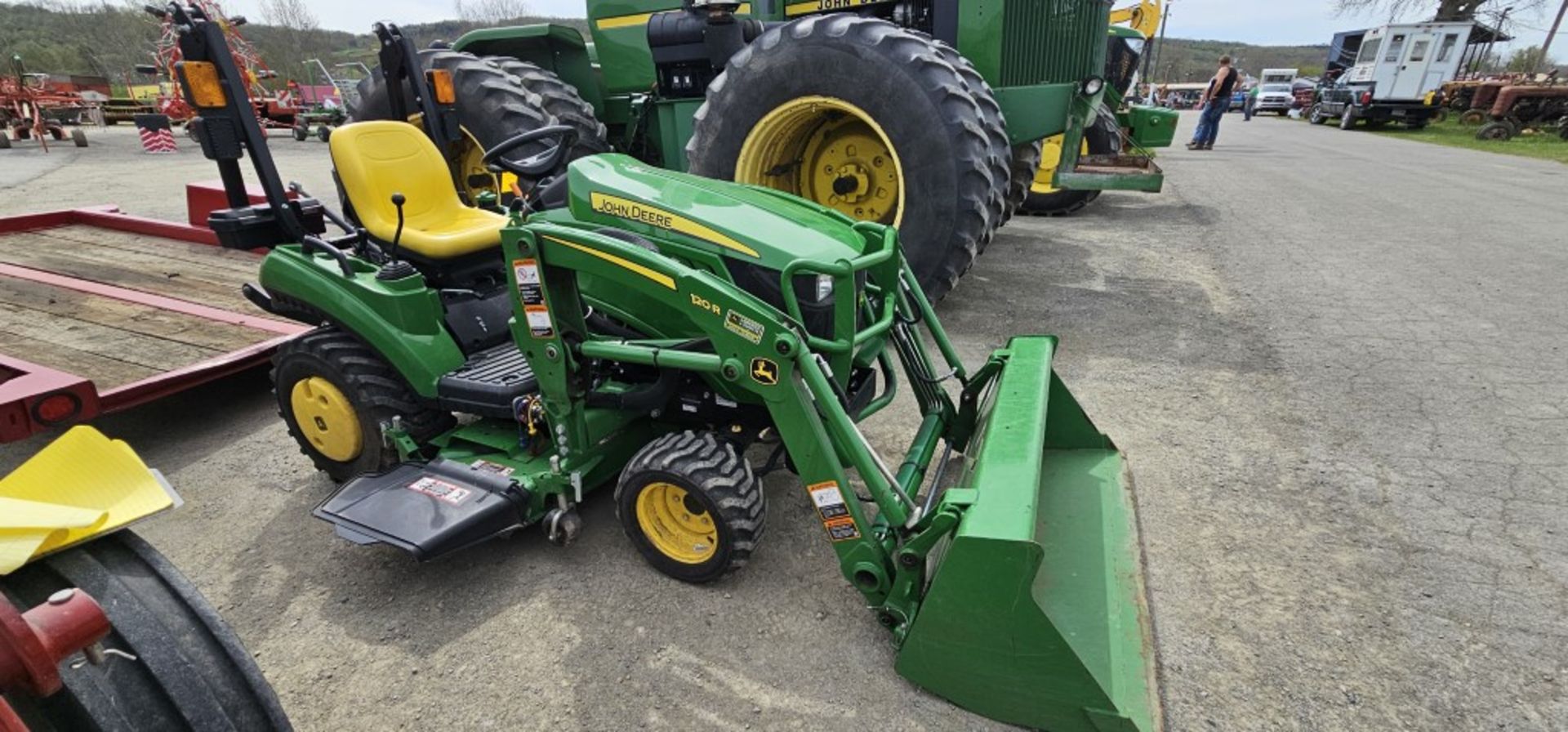 John Deere 1023E Compact Tractor w/ 54'' Auto Connect Deck, Dsl. Eng., 120R Loader Bucket, Rear