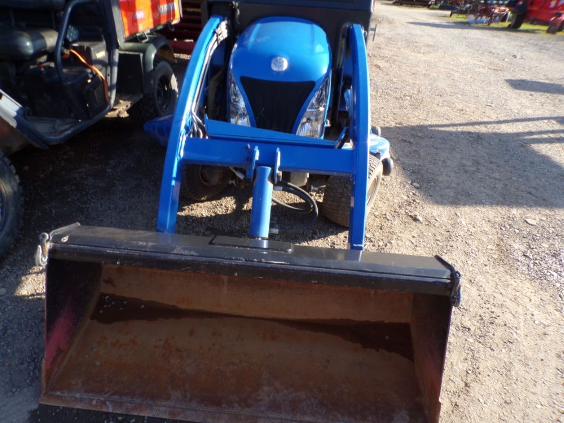 New Holland TZ-24DA Sub Compact Tractor with 10 LA Loader and 60'' Belly Mower, Hydro, 1323 Hrs. ( - Image 3 of 4