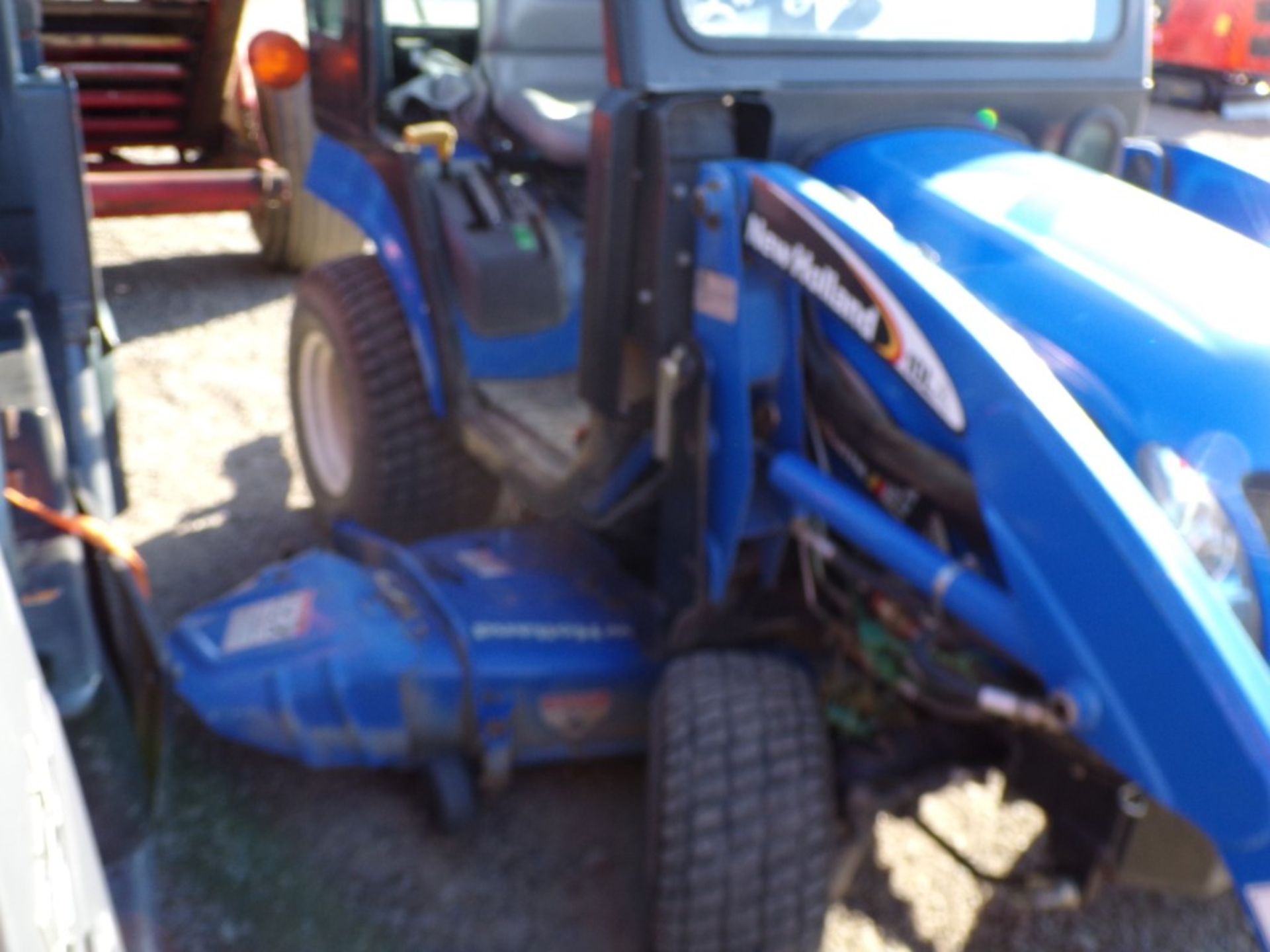 New Holland TZ-24DA Sub Compact Tractor with 10 LA Loader and 60'' Belly Mower, Hydro, 1323 Hrs. ( - Image 4 of 4