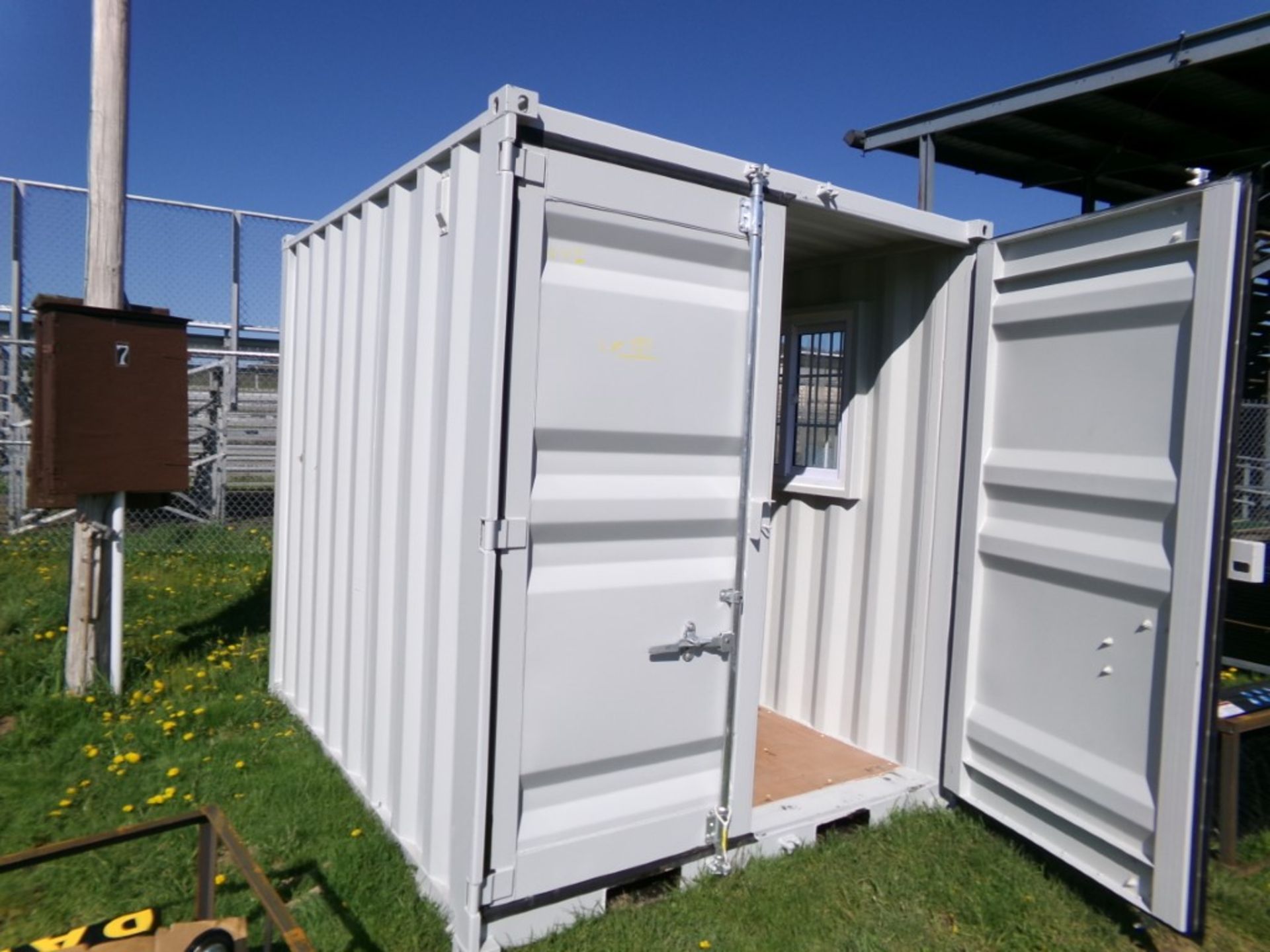 9' Storage Container/Office, 7'4'' Wide with Walk Thru Door and Window on One Side, Cont.# LYP9-