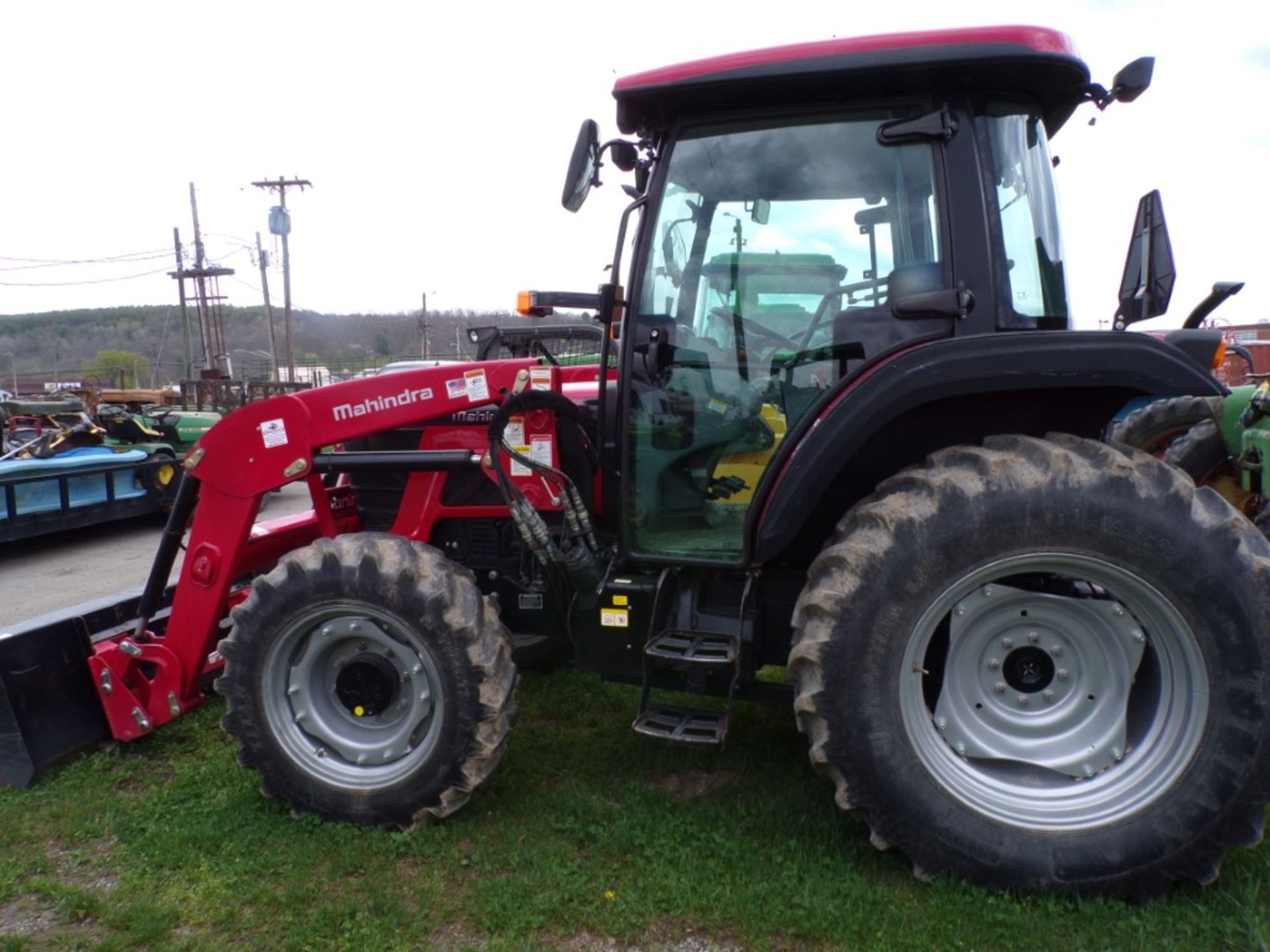 Mahindra 6075-PST 4 WD Tractor with 6075 CL Loader, Shuttle Trans., Skid Steer Bucket Coupler,