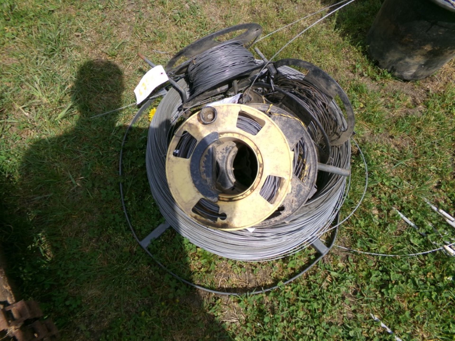 (1) Large Roll and (1) Smaller Partial Roll of High Tensile Electric Fence Wire (5147)