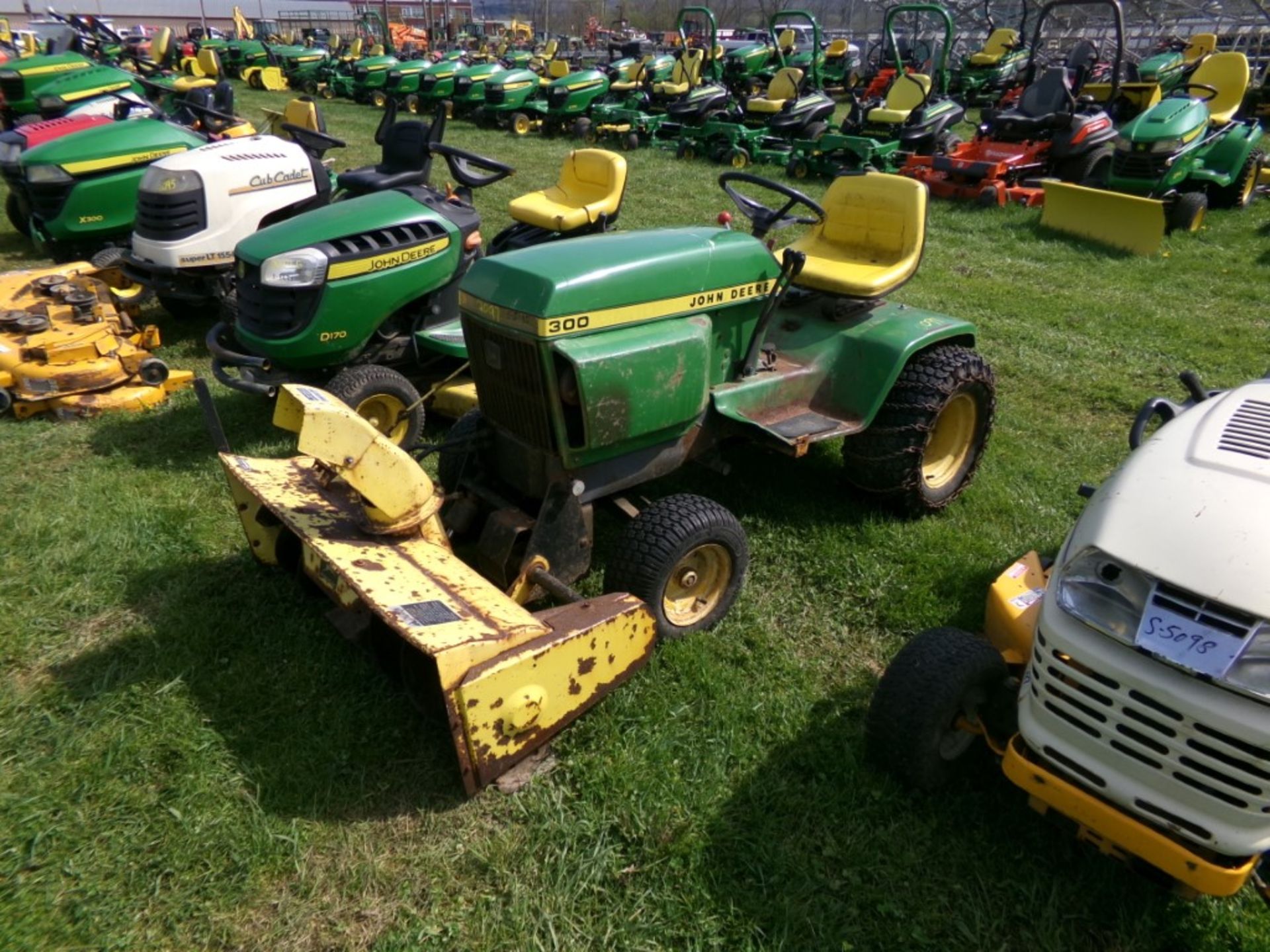 John Deere 300 with Snow Blower and Chains (5185)