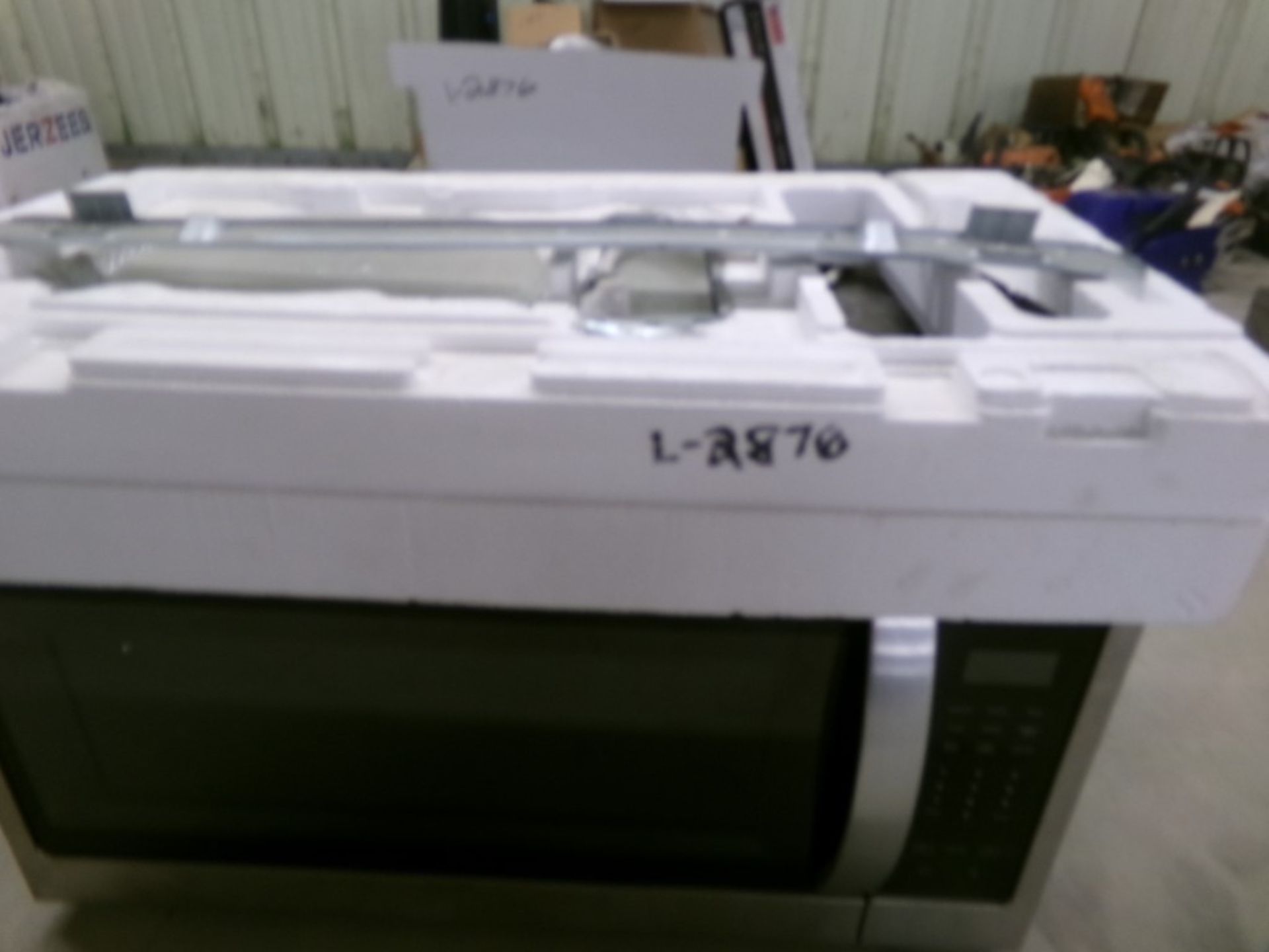 New Delta Faucet in Box, New Whirlpool Microwave, Box with a Toaster Oven and New Pots and Pans (