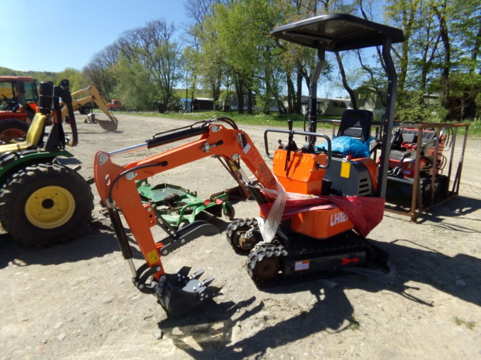 New AGT Industrial LH12R Mini Excavator with Open Cab, Stationary Thumb, Grader Blade, Gas Engine,