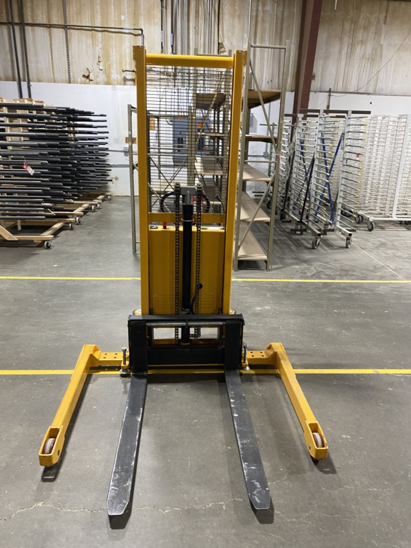 ULINE H-5439 STRADDLE STACKER ELECTRIC FORKLIFT, ELECTRIC LIFT ONLY, MANUAL MOVING, 63'' LIFT - Image 3 of 11