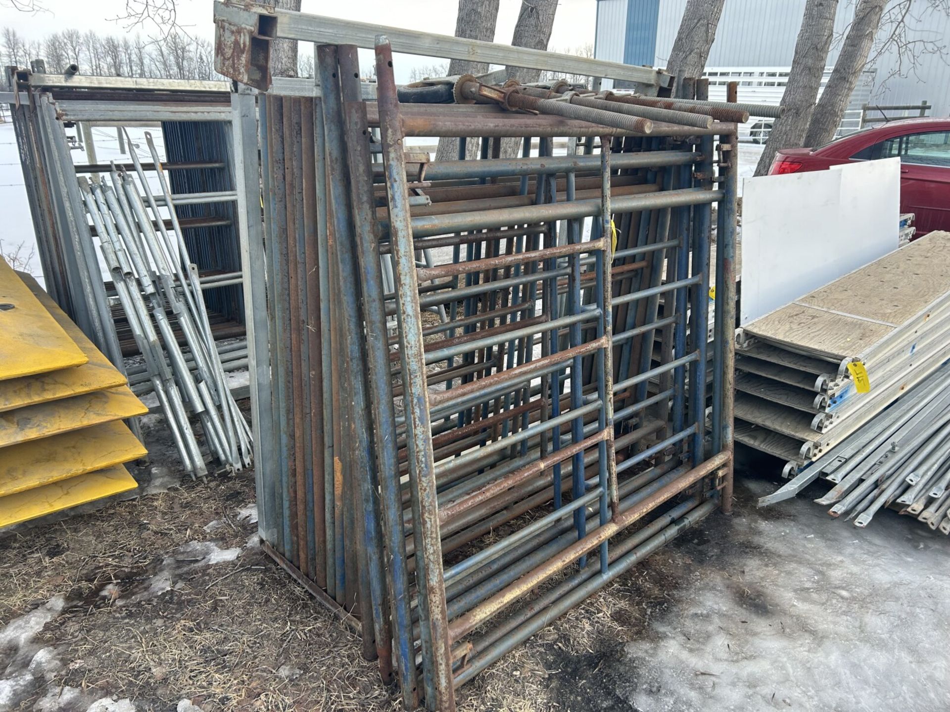 15-5FTX5FT SCAFFOLD FRAMES IN RACK W/ WHEELS, 6-10FT DECKING PLANKS, ASSORTED X-BRACING