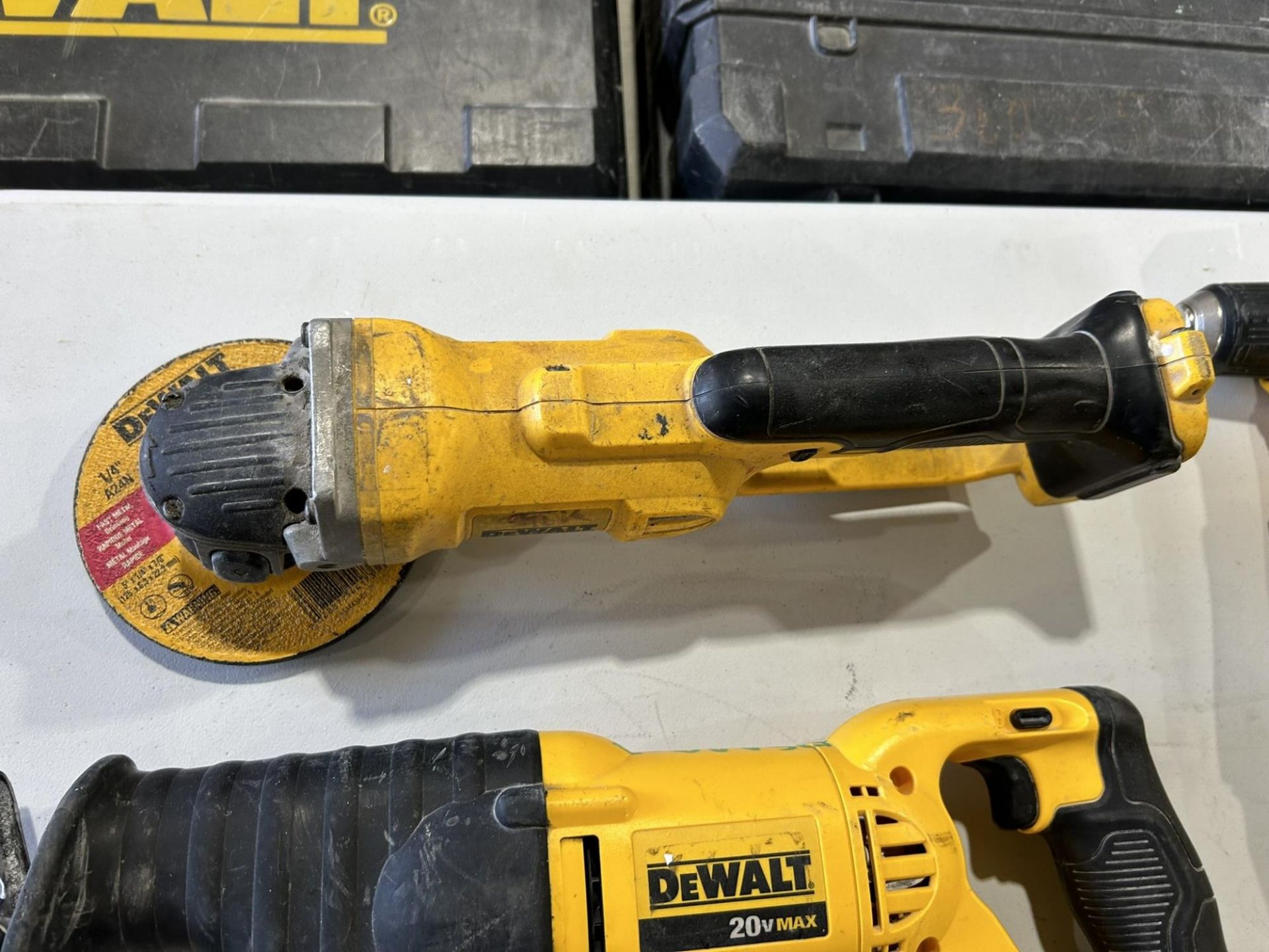 DEWALT CORDLESS RIGHT ANGLE DRILL , RECIPROCATING SAW, ANGLE GRINDER, IMPACT DRIVER, & LIGHT W/ - Image 10 of 11