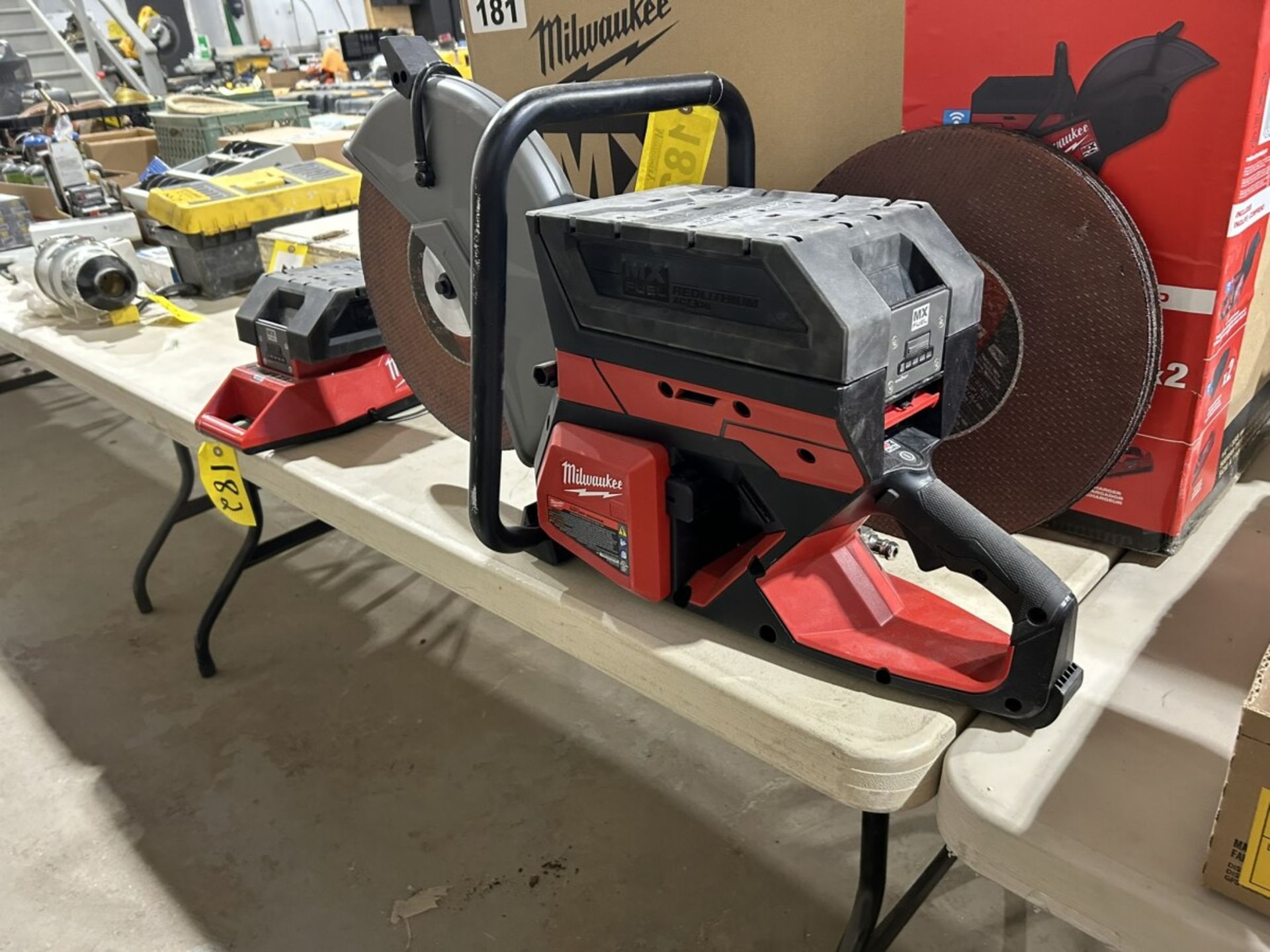 MILWAUKEE MXF314-2XC CORDLESS 14" DEMOLITION SAW W/ 2 XC406 BATTERIES AND CHARGER (USED ONE TIME) - Image 6 of 7