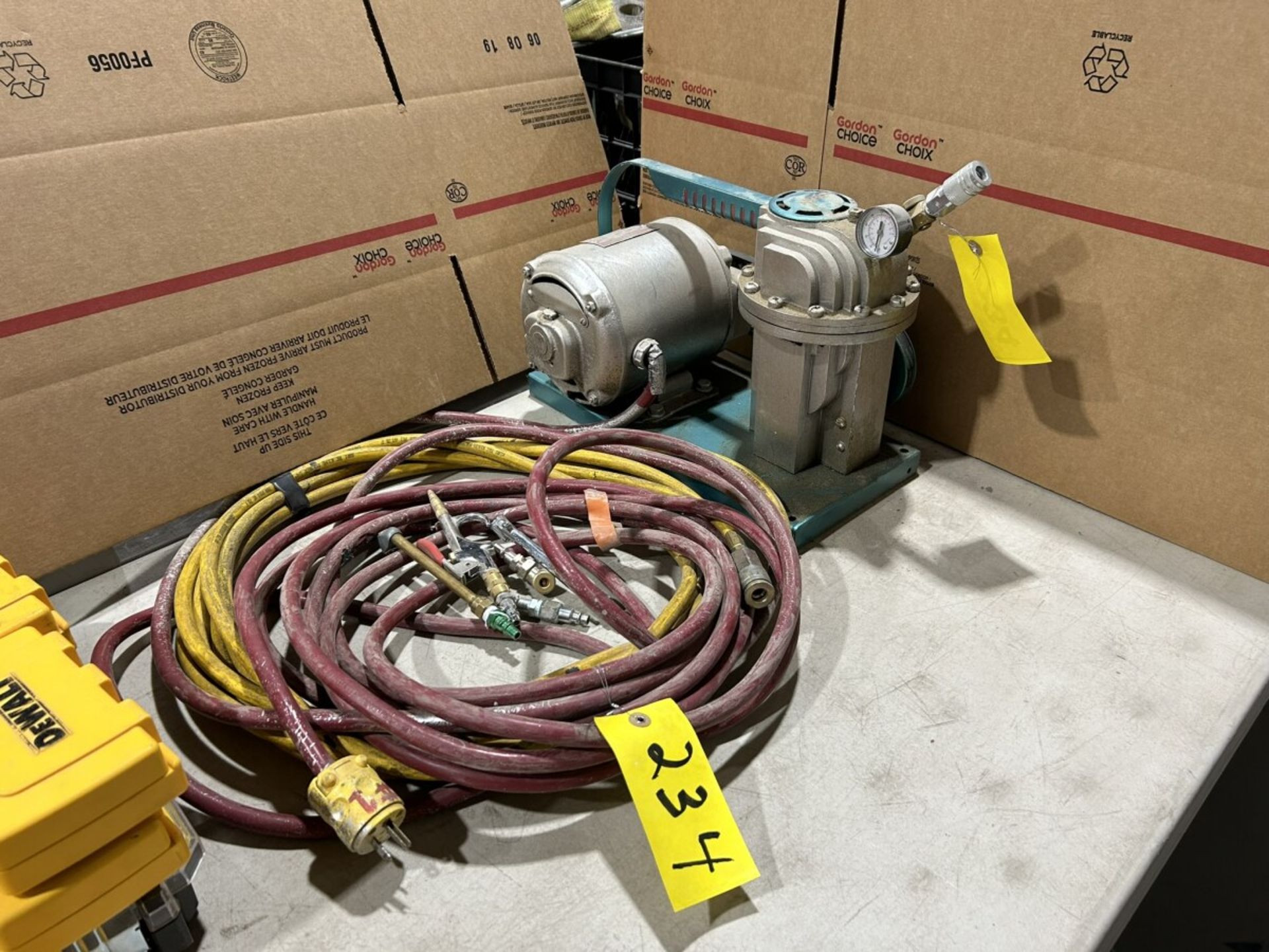 SPEEDY AIR COMPRESSOR W/ HOSE AND ASSORTED FITTINGS