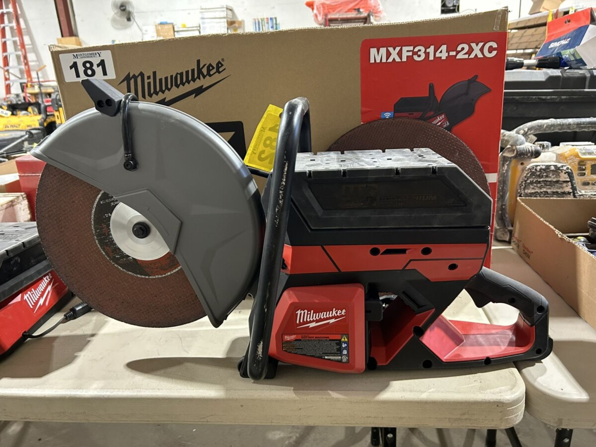 MILWAUKEE MXF314-2XC CORDLESS 14" DEMOLITION SAW W/ 2 XC406 BATTERIES AND CHARGER (USED ONE TIME) - Image 7 of 7