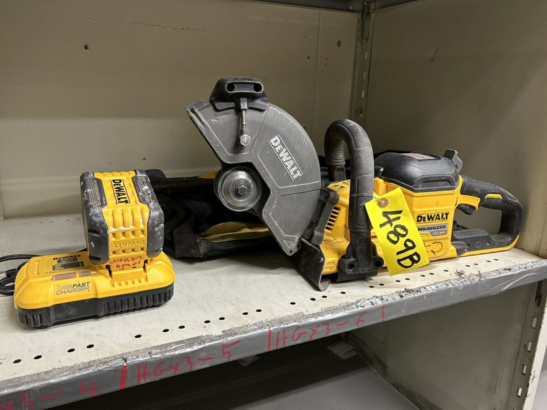 DEWALT CORDLESS 9" DEMOLITION SAW W/ 9.0AH BATTERY, CHARGER AND ASSORTED CUT OFF DISCS