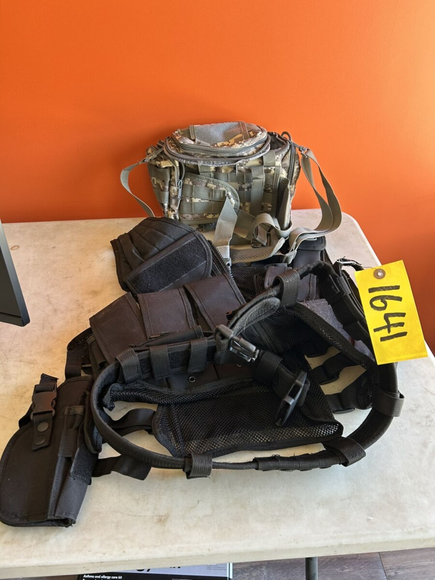 TACTICAL VEST AND CAMO CAMERA BAG