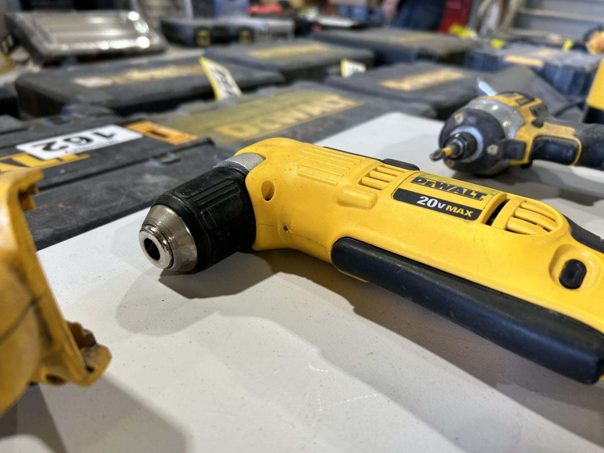 DEWALT CORDLESS RIGHT ANGLE DRILL , RECIPROCATING SAW, ANGLE GRINDER, IMPACT DRIVER, & LIGHT W/ - Image 6 of 11