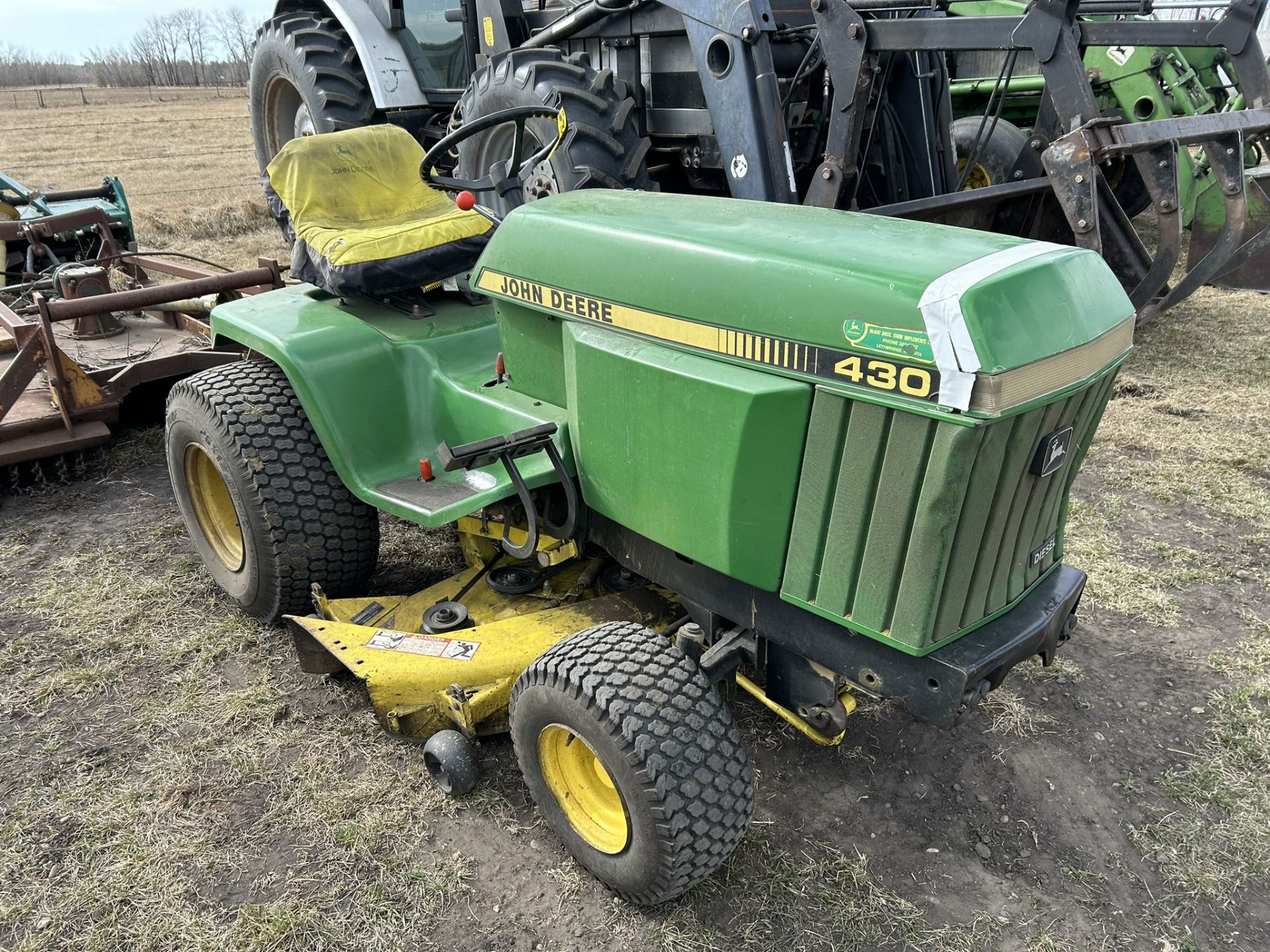 JOHN DEERE 430 DEISEL GARDEN TRACTOR. HYDROSTATIC, 2 SCV, POWER STEERING, FRONT AND MID PTO, 48"