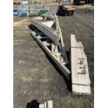 PACKAGE OF WOOD TRUSSES - 25'6" OVERALL, 7'-4 1/2" TO PEAK 12" HEEL, 30FT TRUSSES ON BOTTOM OF STACK