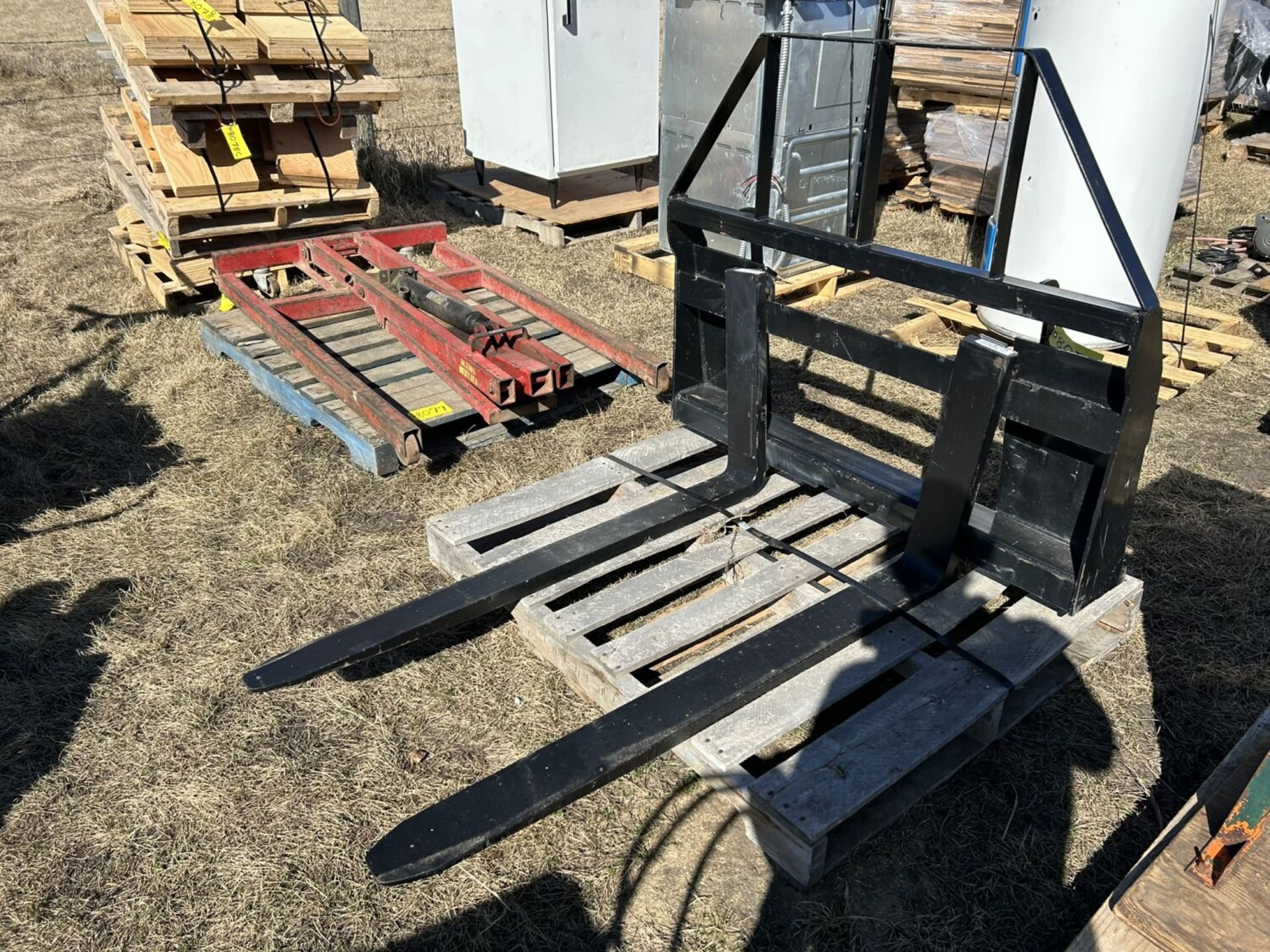 UNUSED 48 IN PALLET FORKS FOR SKID STEER