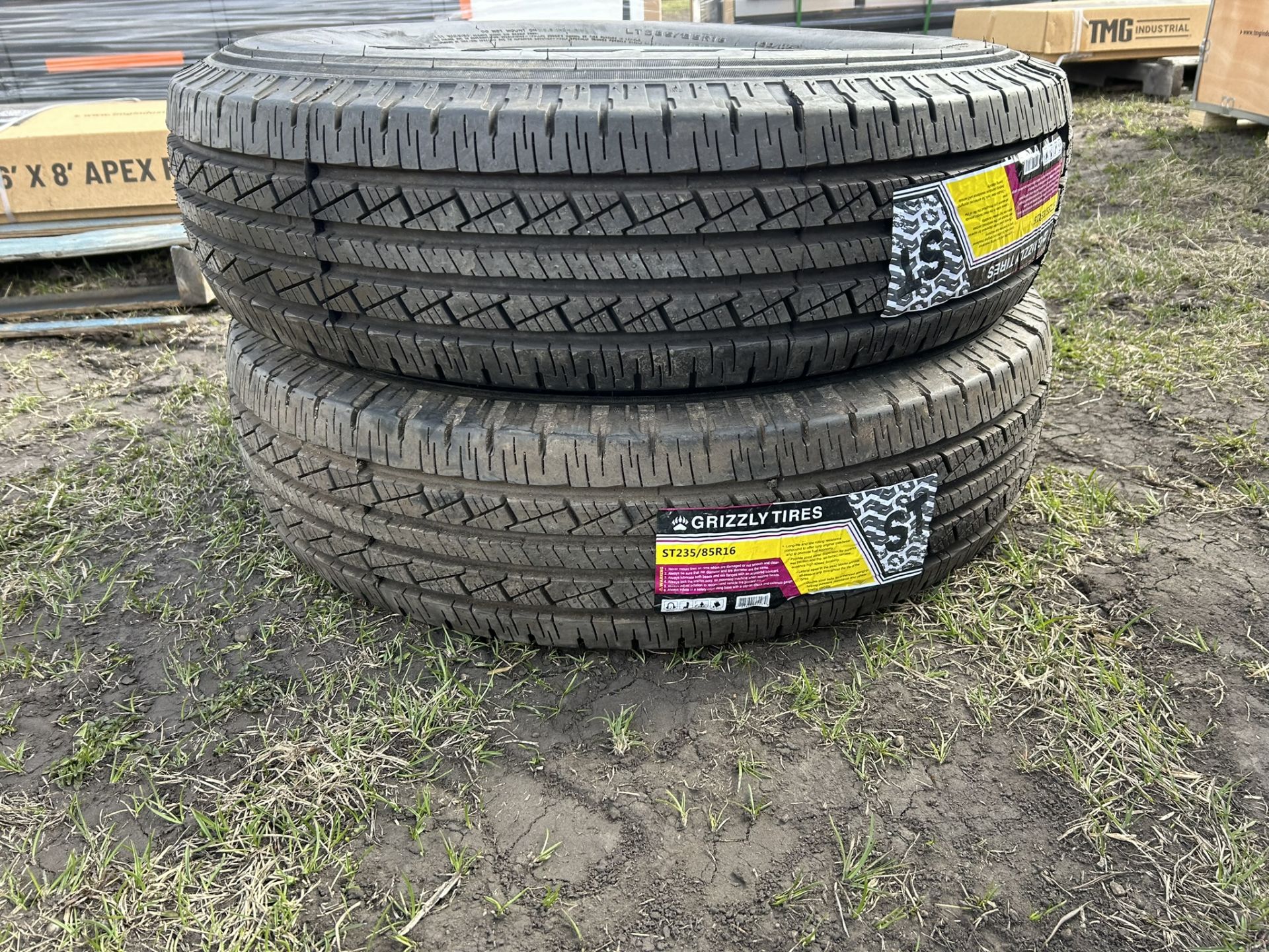 2 - GRIZZLY ST-235/85R16-10PR TRAILER TIRES W/ 8 BOLT RIMS (TIMES THE MONEY X2) - Image 2 of 4