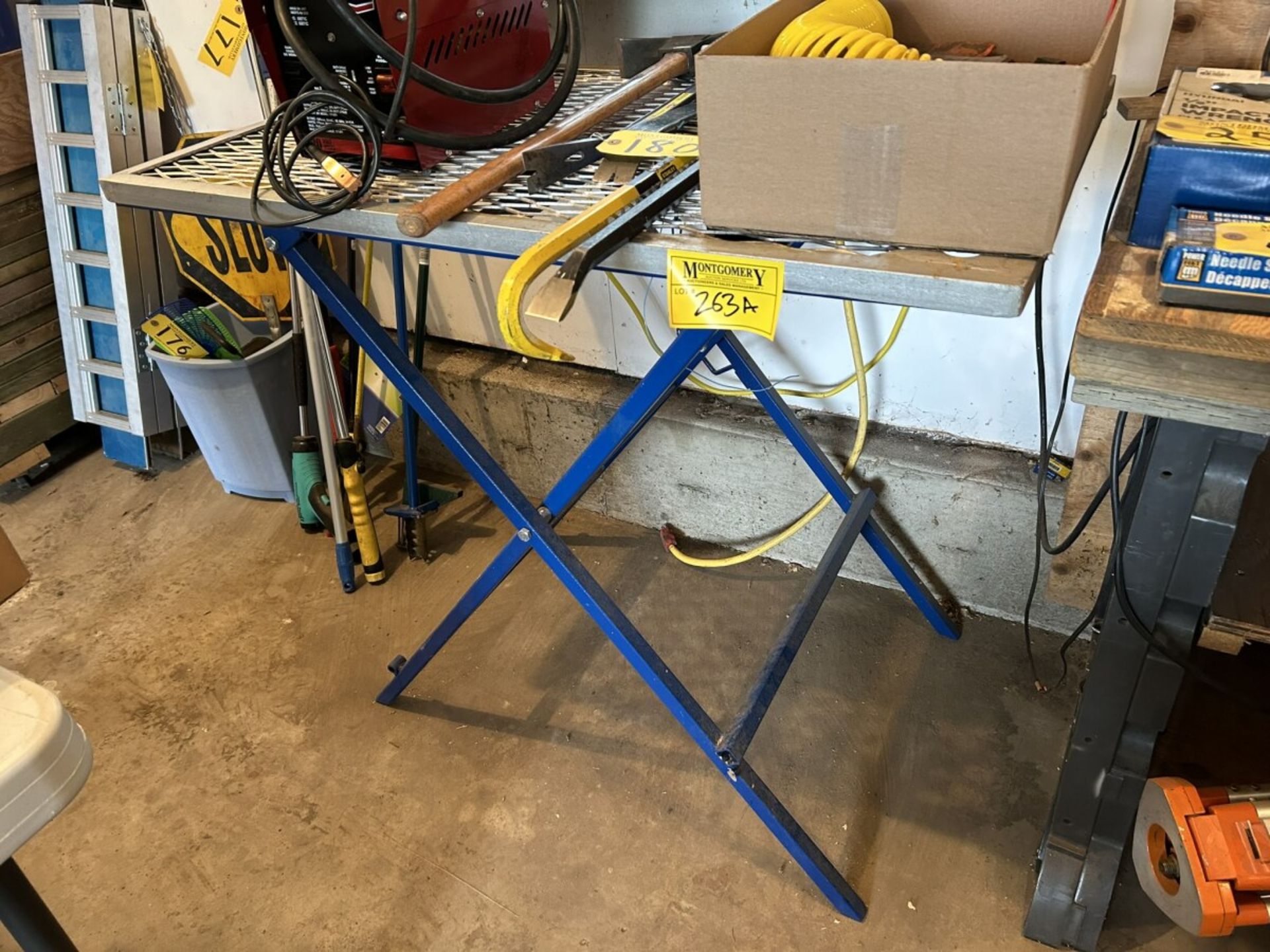 STEEL FOLDING TABLE W/ STEEL MESH TOP