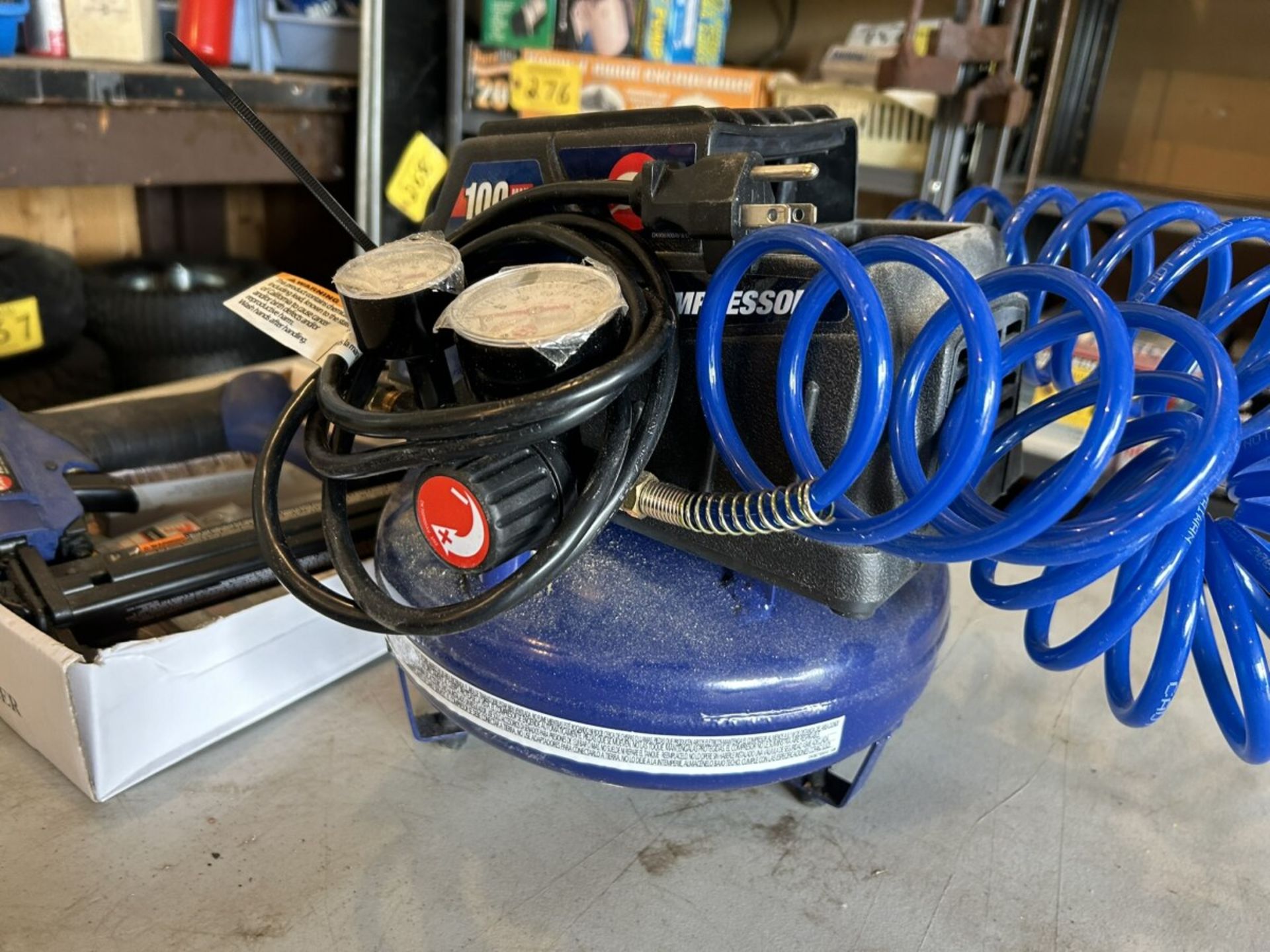 CAMPBELL HAUSFELD PORTABLE AIR COMPRESSOR AND PNEUMATIC BRAD NAILER/STAPLER W/ ASSORTED STAPLES - Image 2 of 9