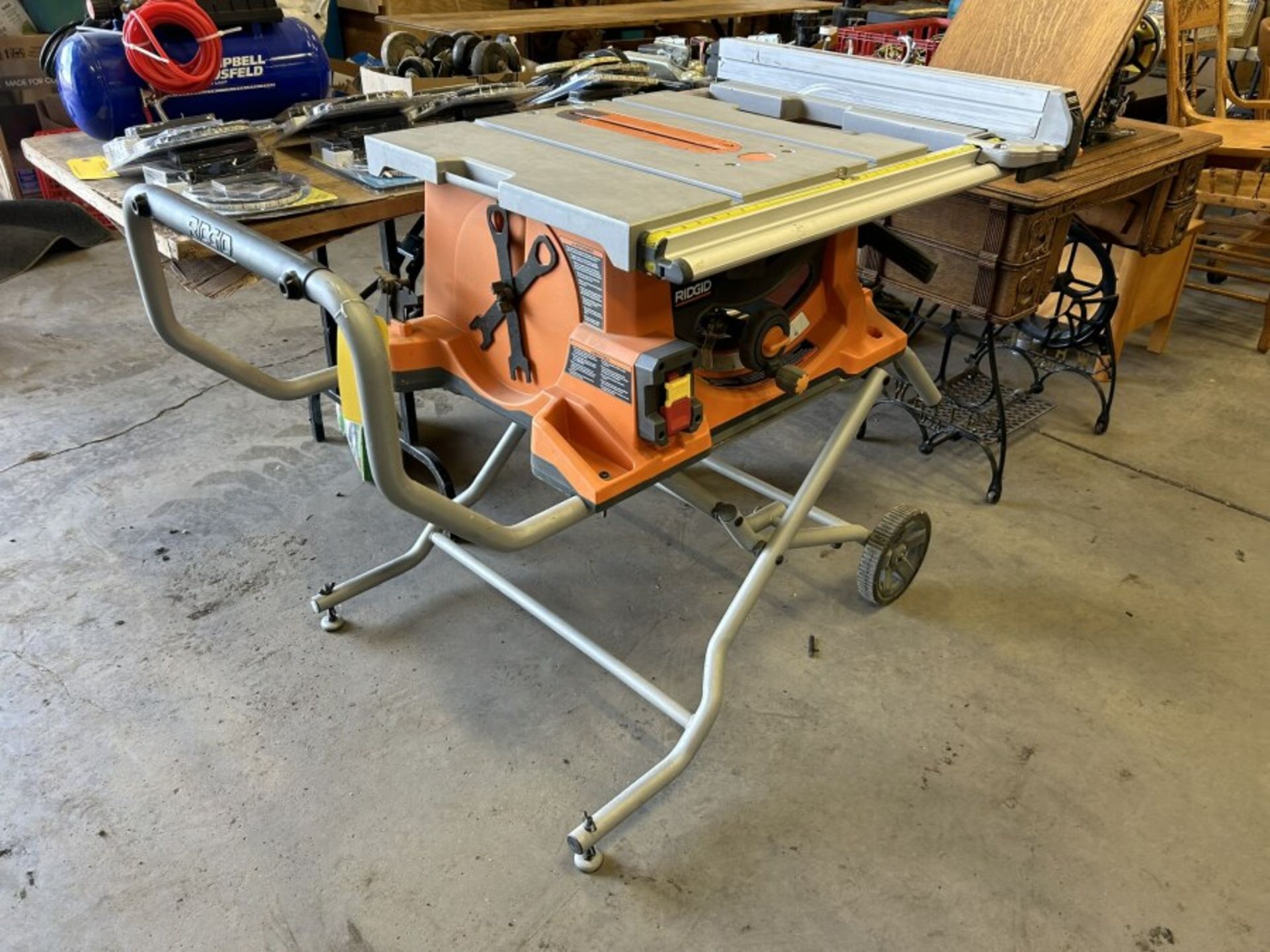 RIDGID 10" PORTABLE TABLE SAW W/ COLLAPSIBLE STAND