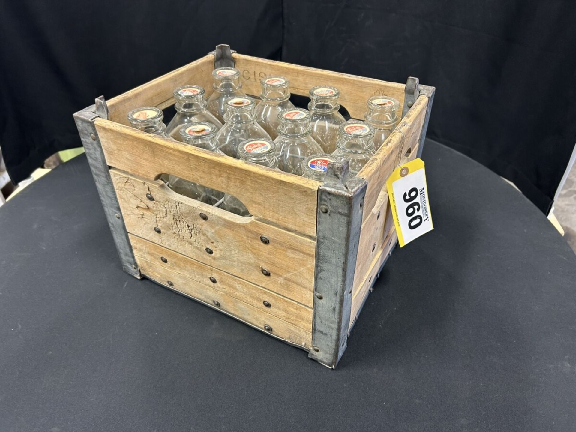 ANTIQUE MILK BOTTLES AND CRATE