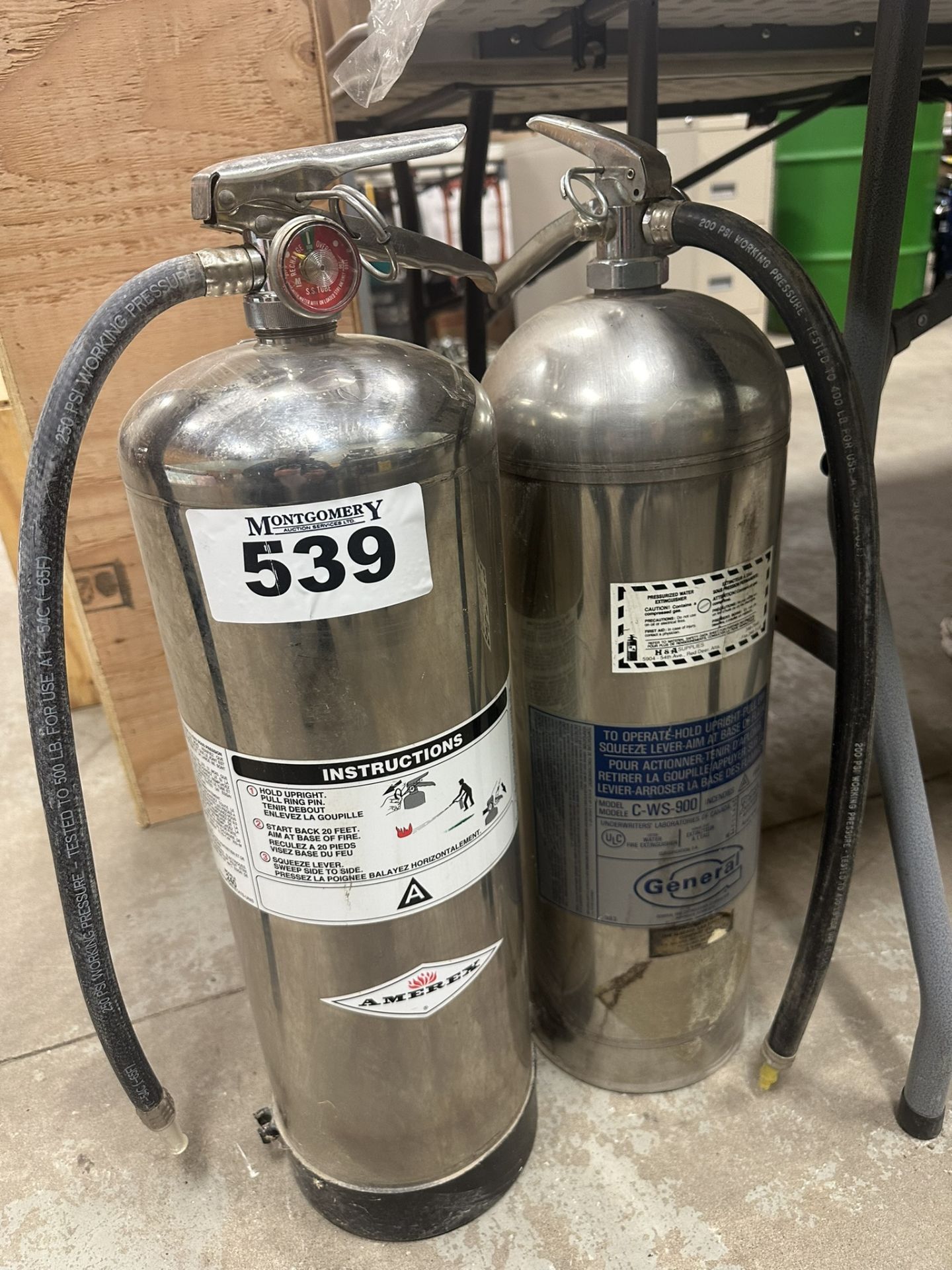 2-SS FIRE EXTINGUISHERS (BOTH HAVE BEEN DISCHARGED)