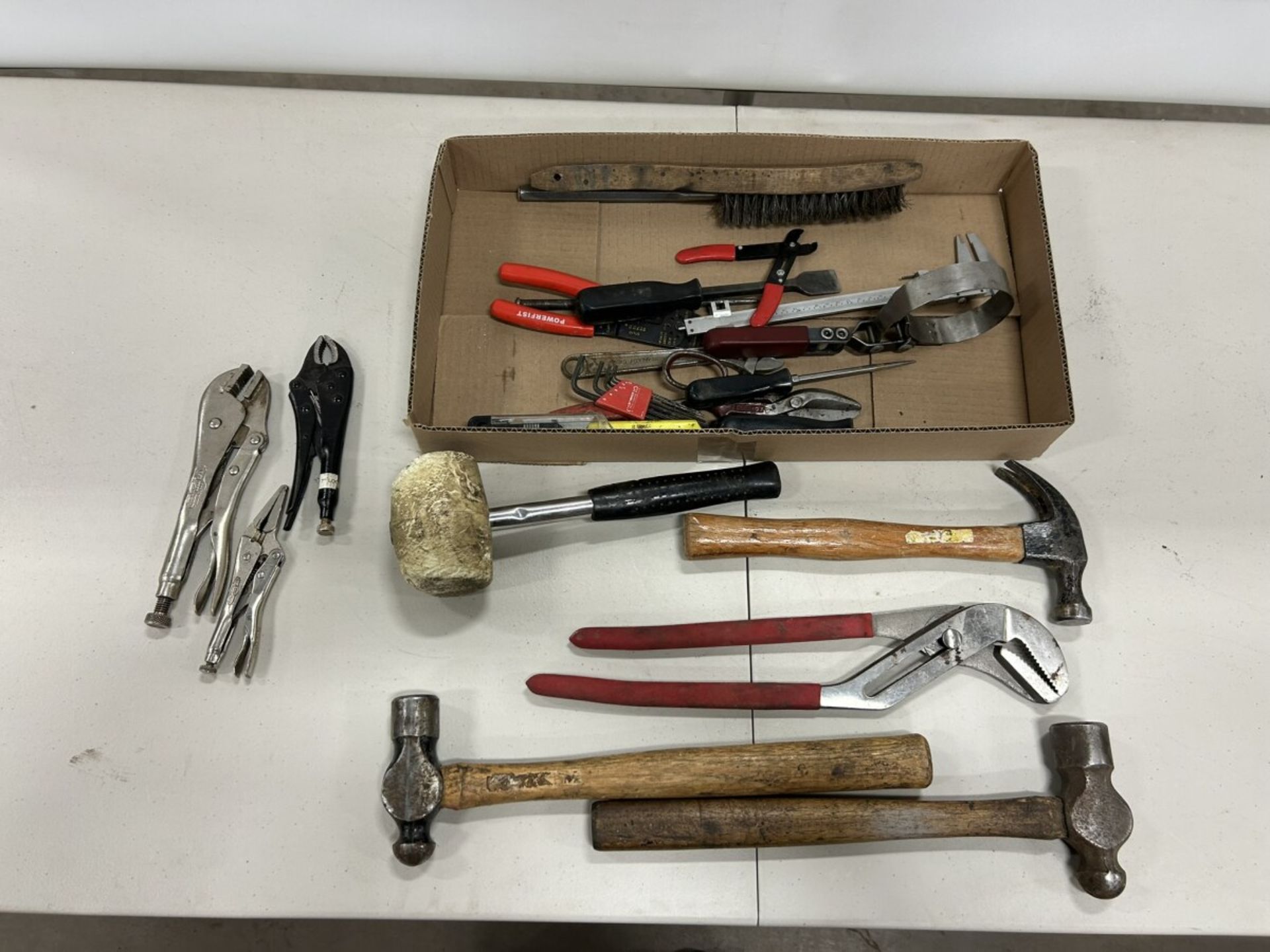 L/O ASSORTED HAND TOOLS -RUBBER MALLET, HAMMERS ,VICE GRIPS, PRY BARS, ETC.