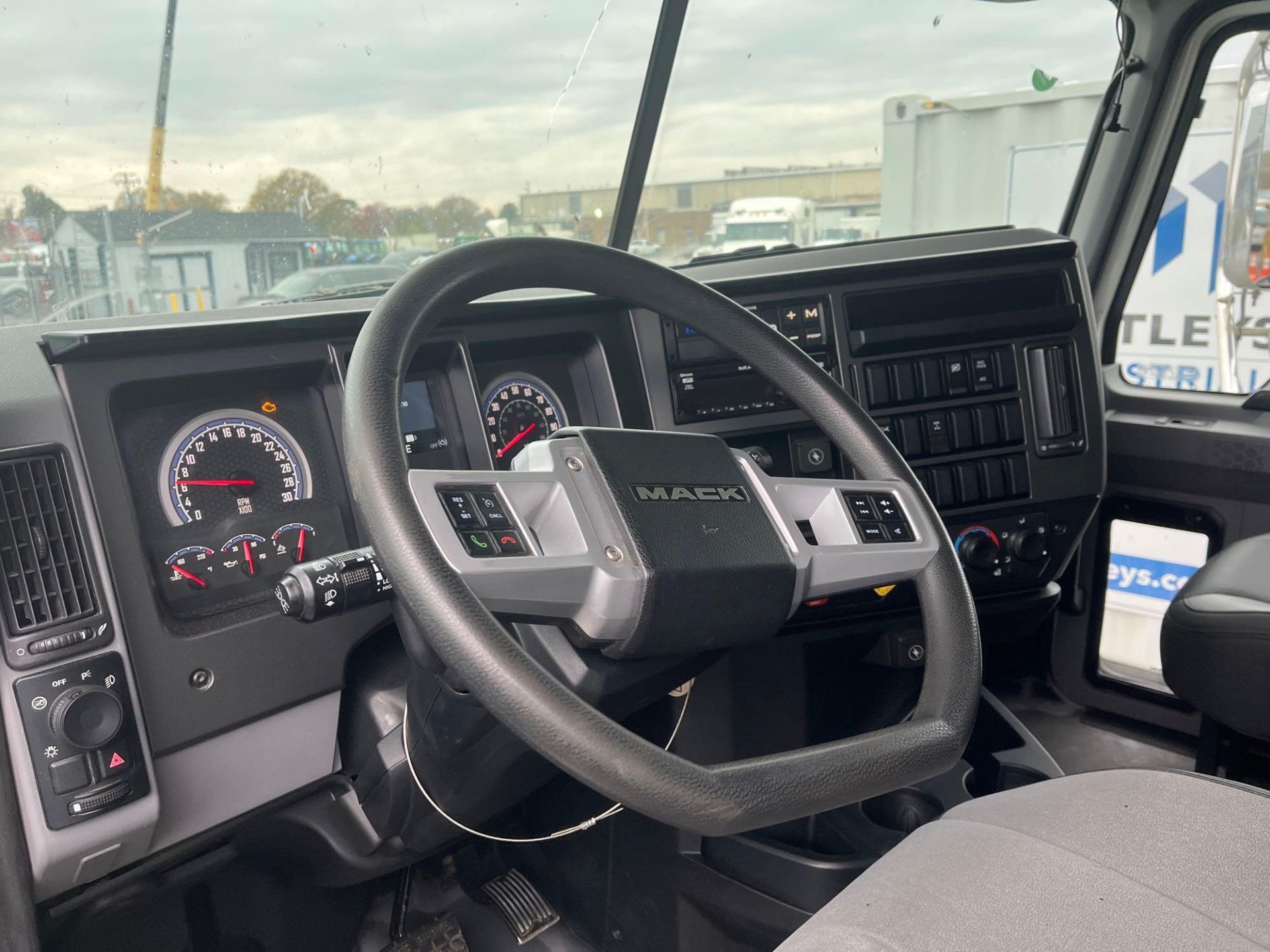 2020 Mack Granite GR64F Tri-Axle Dump Truck - Image 7 of 21