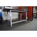 TABLE USED FOR TIG WELDING. 42" X 72" WORKING AREA, 1" THICK HEAVY STEEL TOP, 35" H, NO CONTENTS