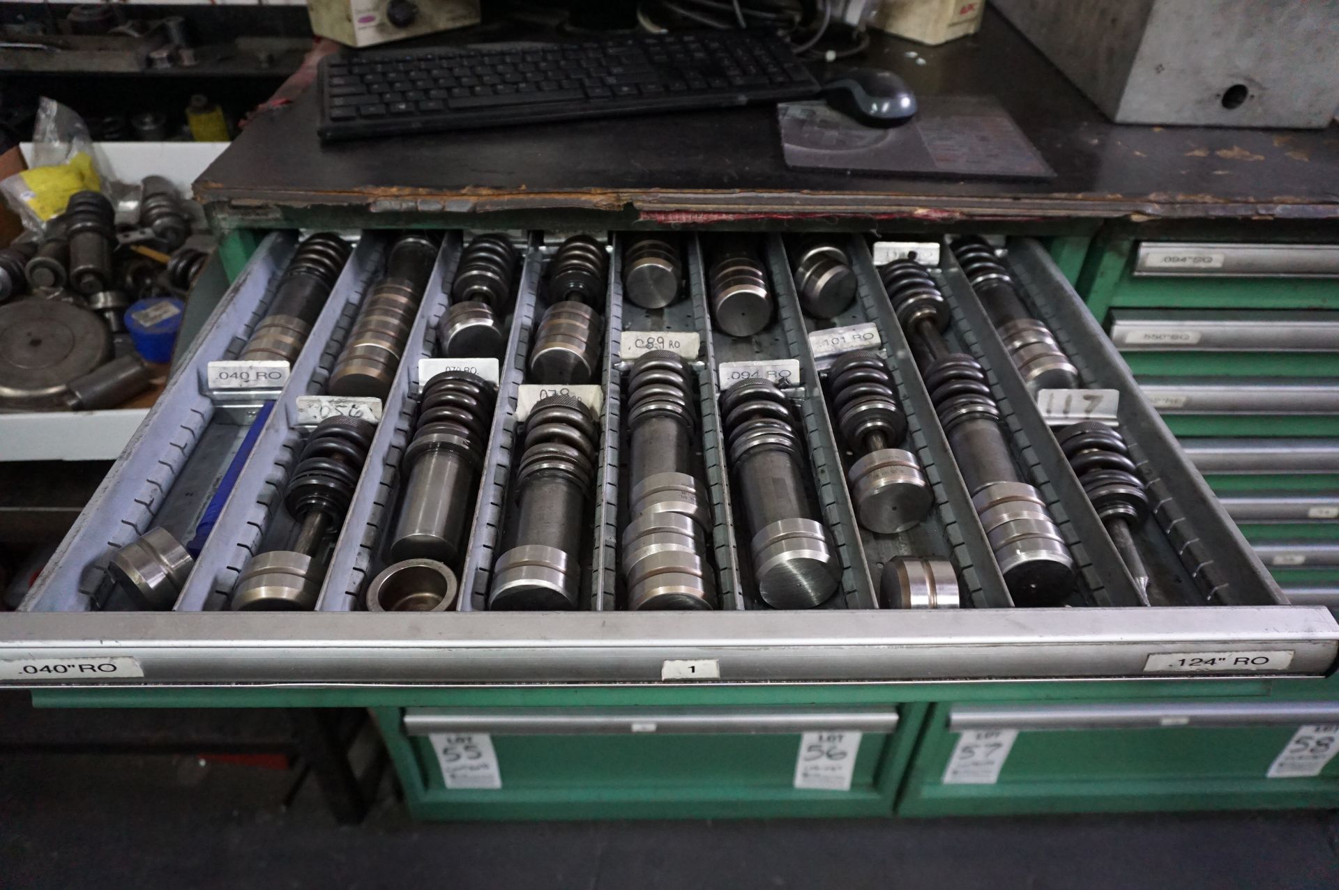CONTENTS OF 9 DRAWER CABINET TO INCLUDE: .040" ROUND PUNCHES - 1.250" ROUND PUNCH TOOLING 1 1/4"