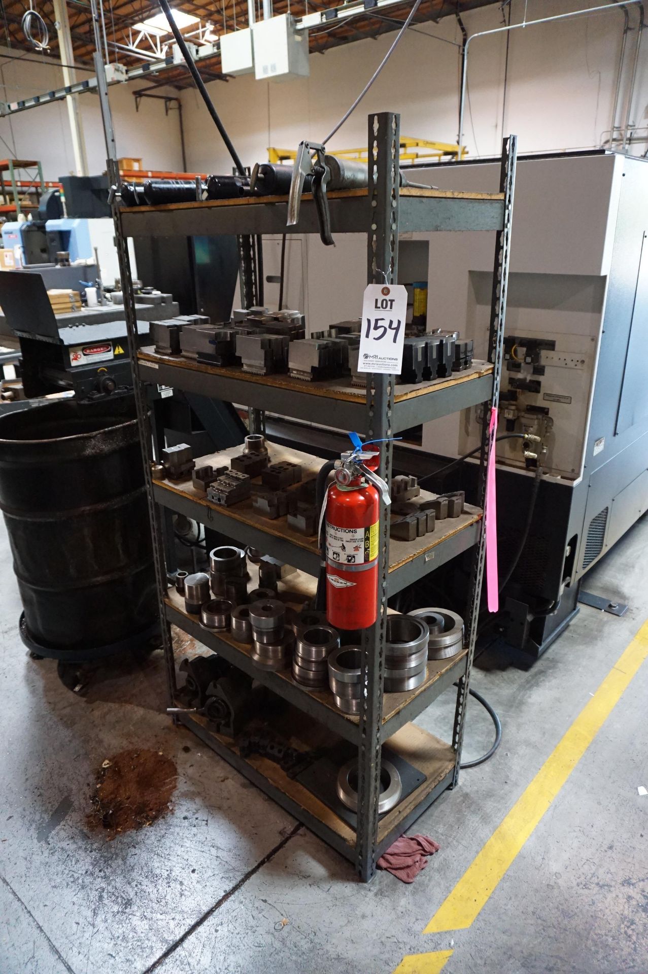 SUPPORT LOT NEAR LATHE TO INCLUDE: (2) STEEL INVENTORY RACKS, (2) STEEL CARTS, (1) WORK BENCH