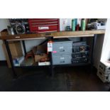 TABLE AND CARTS IN MAINTENANCE ROOM TO INCLUDE: (1) HEAVY DUTY WORK BENCH WOOD TOP STEEL LEGS, 72" X