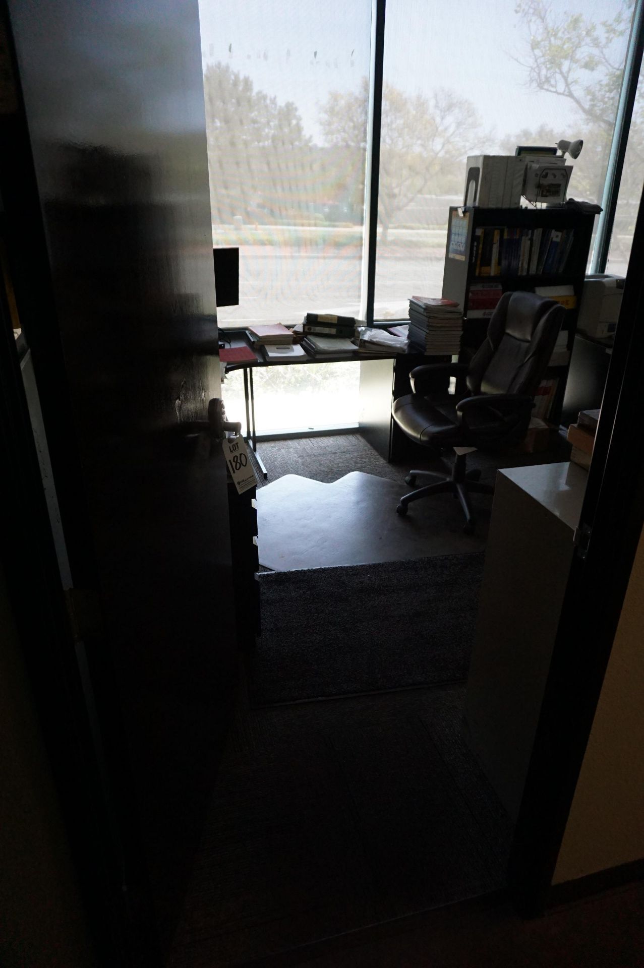 CONTENTS OF FIRST FLOOR OFFICE TO INCLUDE: (2) L DESKS, DUAL MONITOR STAND WITH MONITORS, (2) OFFICE