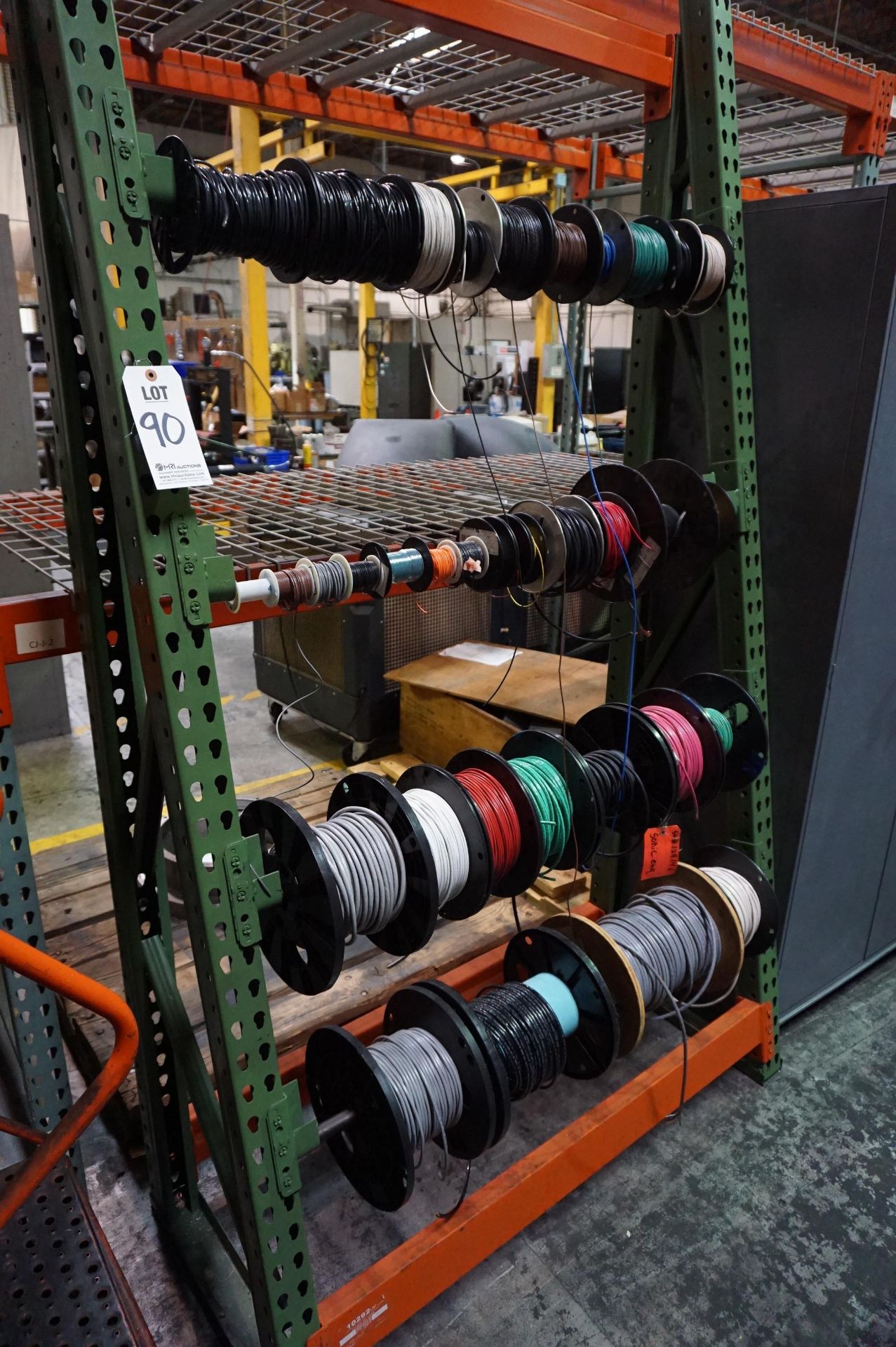 ADJUSTABLE STEEL RACK FOR WIRE SPOOLS WITH CONTENTS TO INCLUDE: SPOOLS OF WIRE, VARIED SIZES