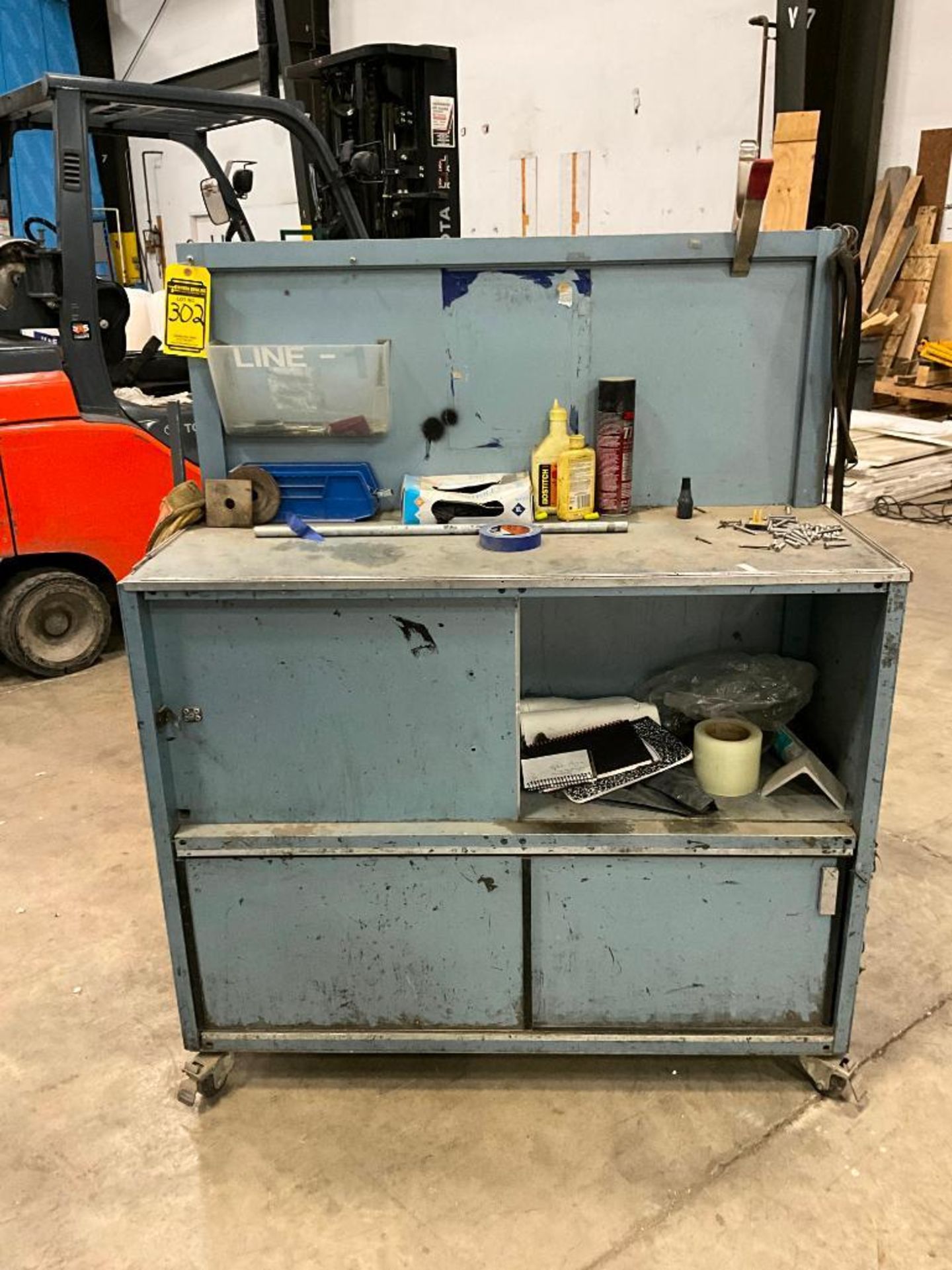 Metal Cabinet on Casters, 61" H x 49" W x 19" D
