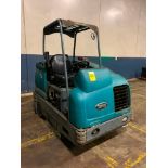 Tennant T-20 Ride-On Floor Scrubber, LPG, S/N T20-10976, 1,356 Hours ($100 Loading Fee will be added