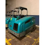 Tennant T-20 Ride-On Floor Scrubber, LPG, S/N T20-10103, 2,353 Hours ($100 Loading Fee will be added
