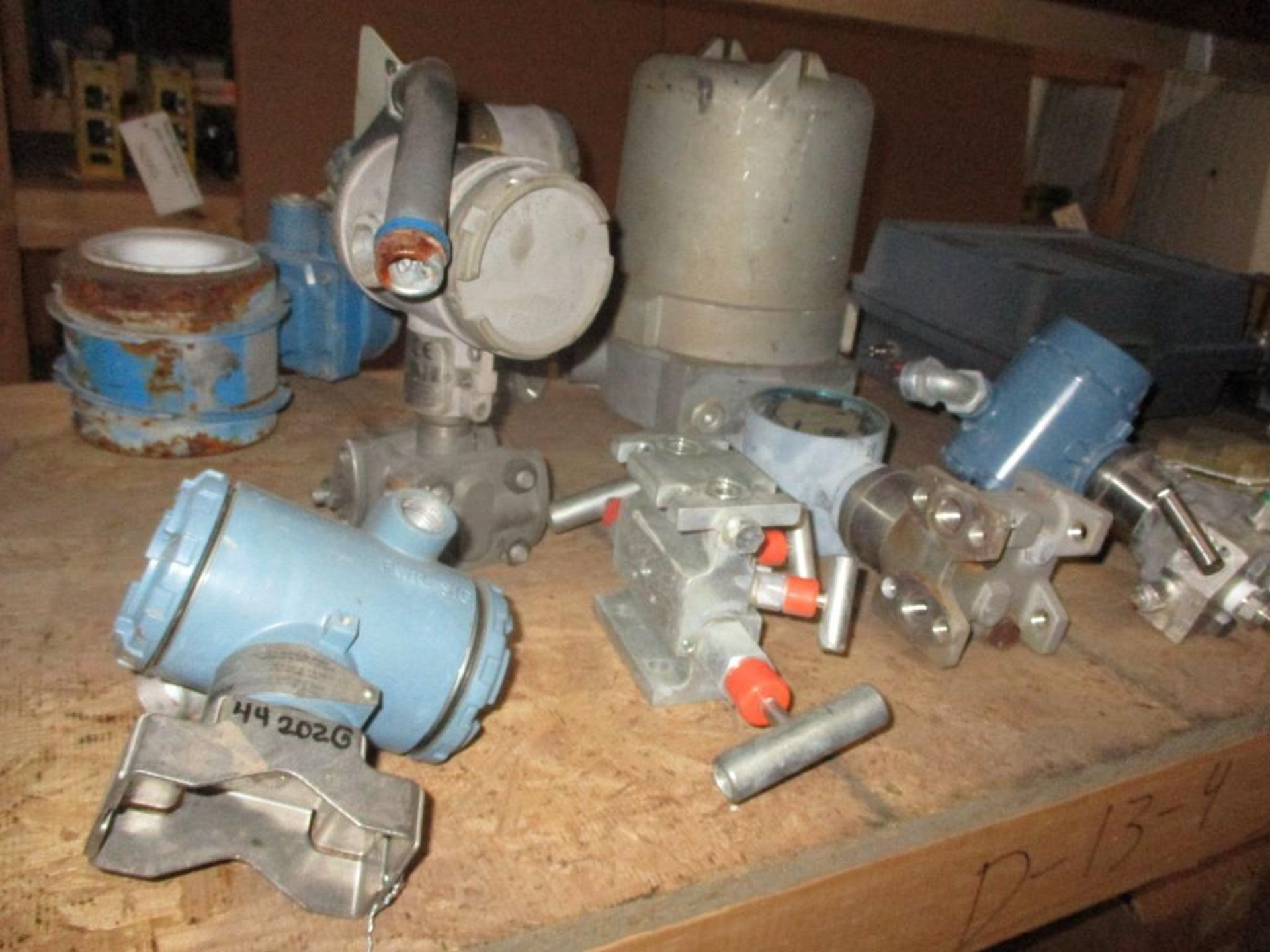 Contents of Shelf D-13-4 & D-13-5; Hydraulic Pumps, Rosemount Transmitters, Hydraulic Valves, Square