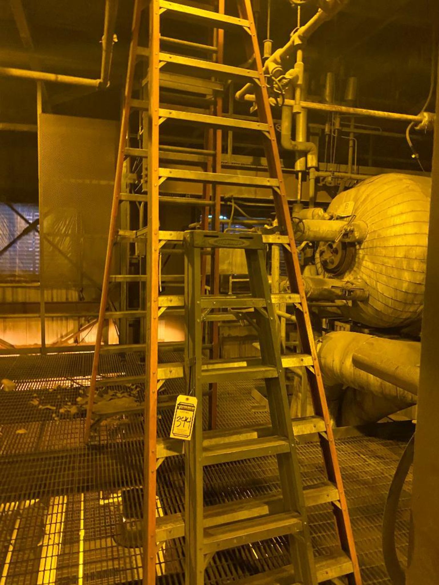 (2) Werner Step Ladders, 12' & 6' (Located on second floor of the plant)