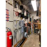 Assorted V-Belts, Hose on Wall, & Items in the Corner