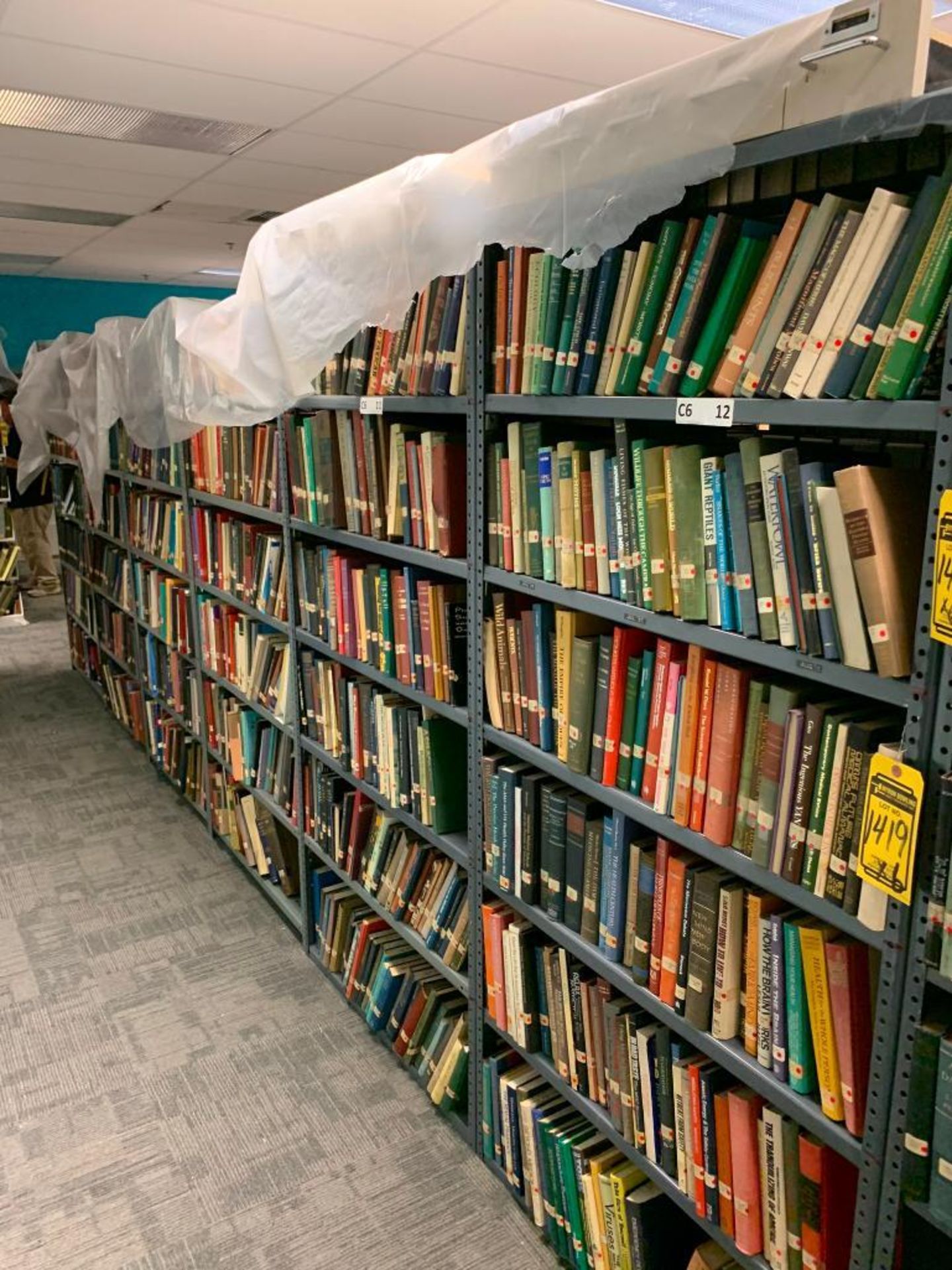 (6) Sections of Clip Shelving w/ Assorted Books, Animal, Mythology, Education, Criminal Law, Guns