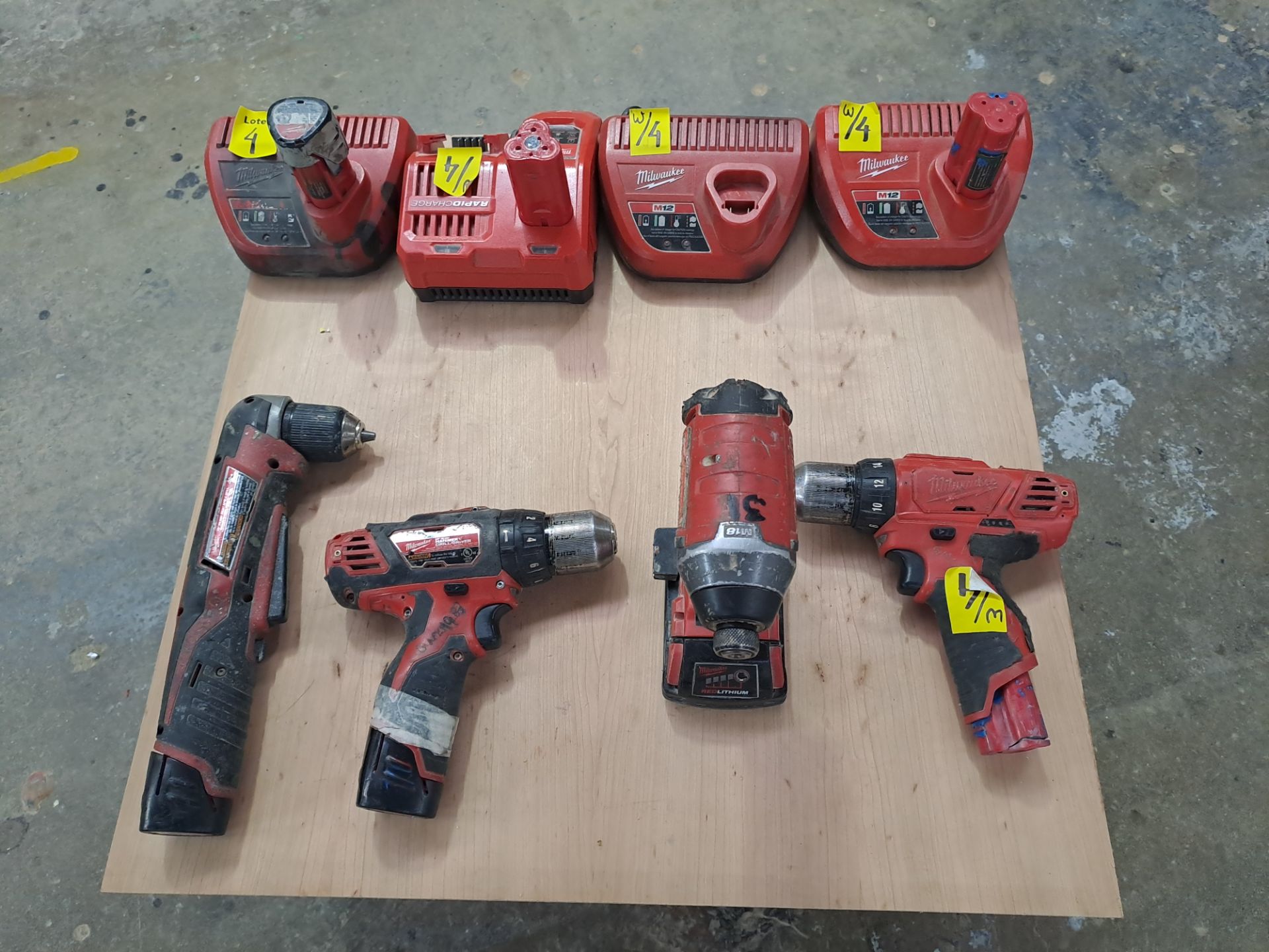 Lot of 4 pieces contains: 2 Milwaukee cordless drills (includes 2 chargers and 1 extra battery); 1
