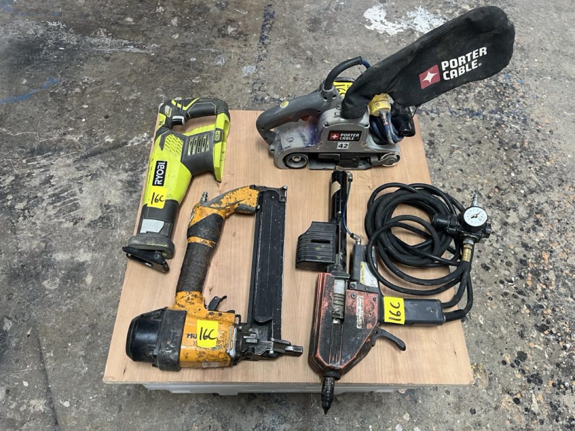 Lot of 4 pieces contains: 1 Porter electric sander with dust collector; 1 Ryobi wood saw without ba