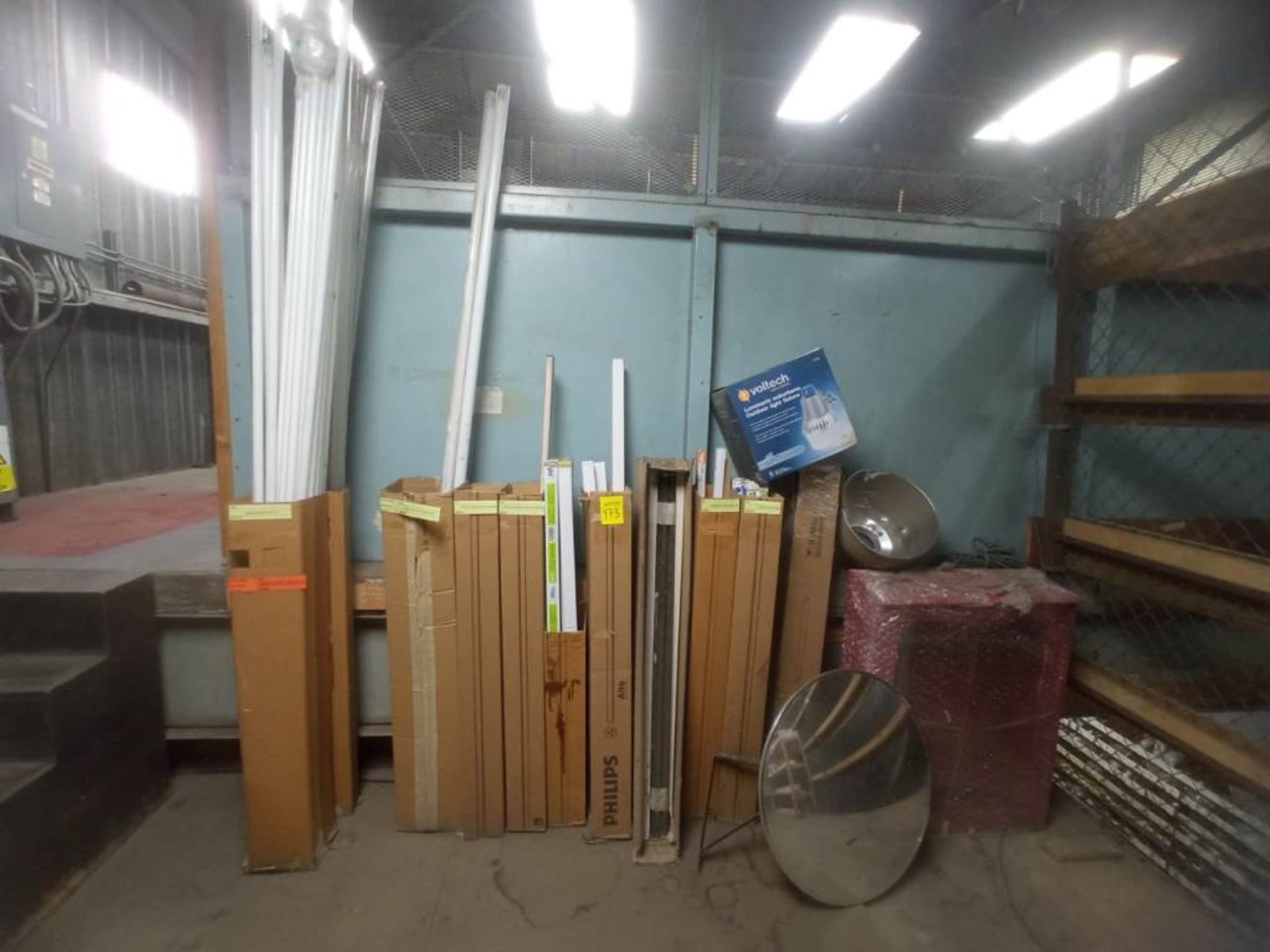 Lot contents of 9 boxes: 4 and 8 ft. fluorescent lamps, 1 fire hose cabinet, black lamps, 1 convex