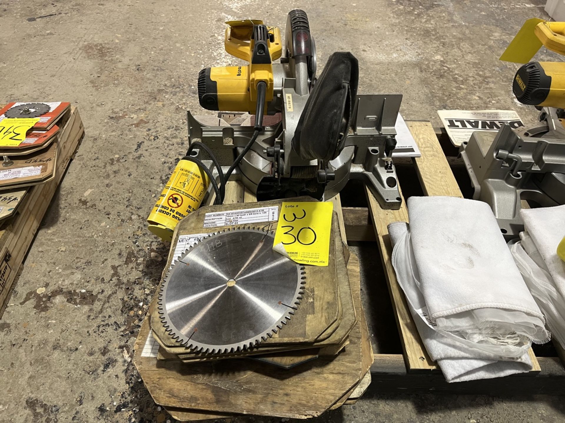 DEWALT 12" Miter Saw, Model DWS780, Serial No. SS, 120V, Includes 5 different sized blades and dust