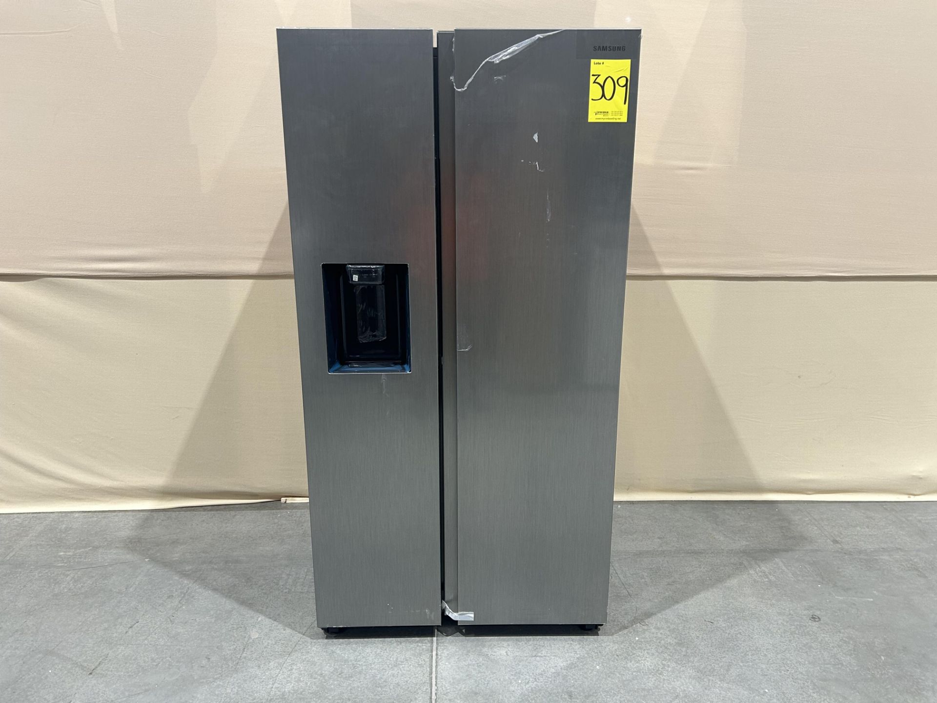 Refrigerador con dispensador de agua Marca SAMSUNG, Modelo RS27T5200S9, Serie 00143H, Color GRIS (E