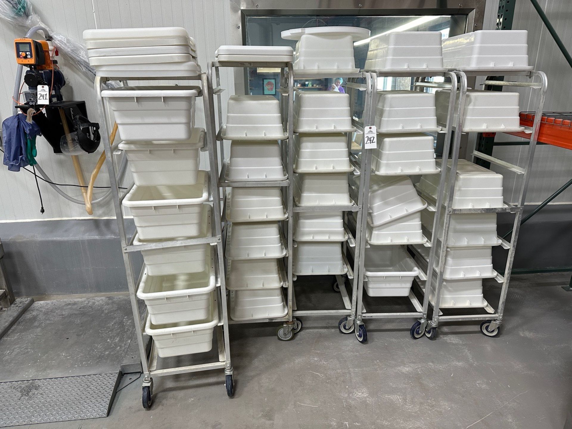 Lot of White Plastic Bins with Carts | Rig Fee $150